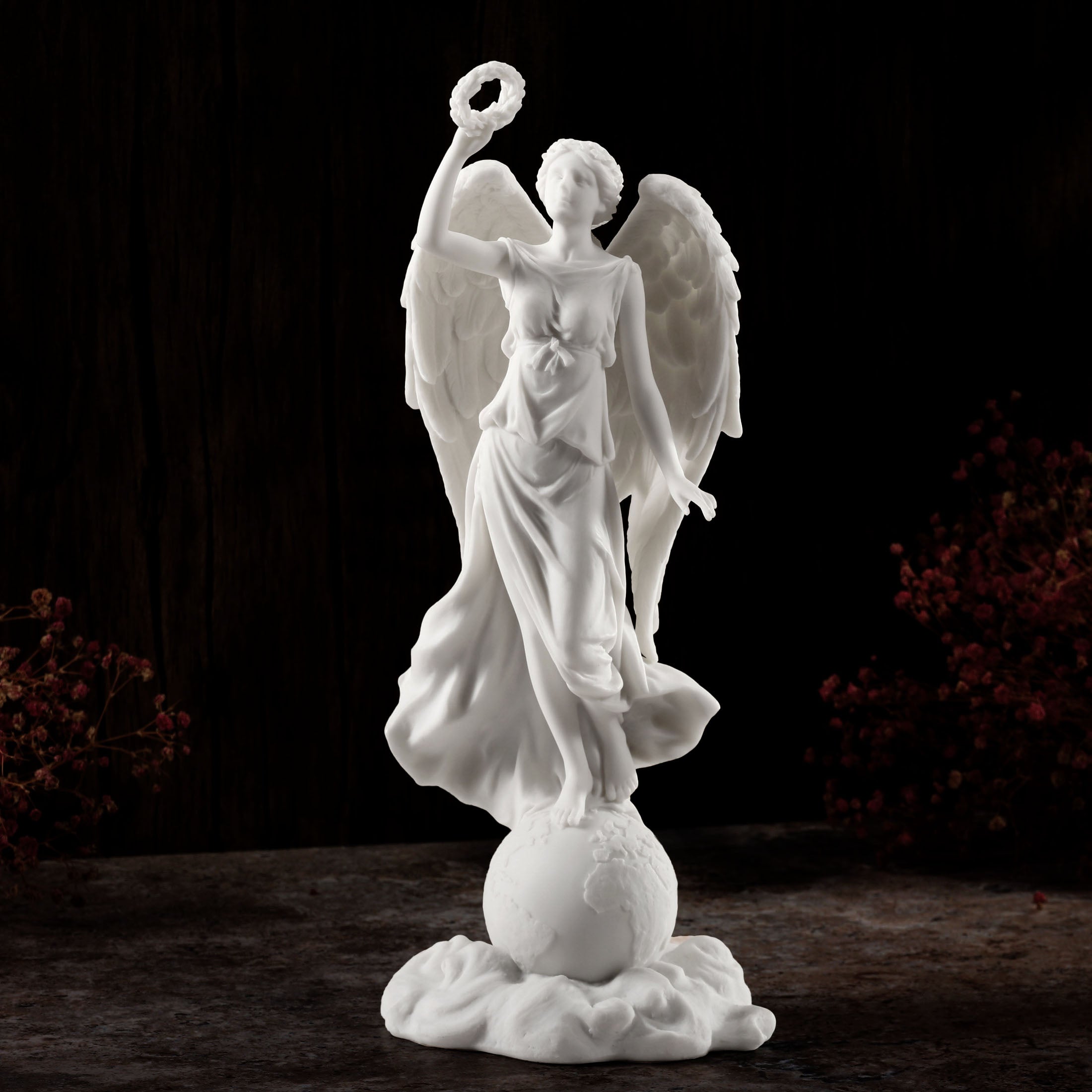 Angel Holding Wreath Standing On Earth