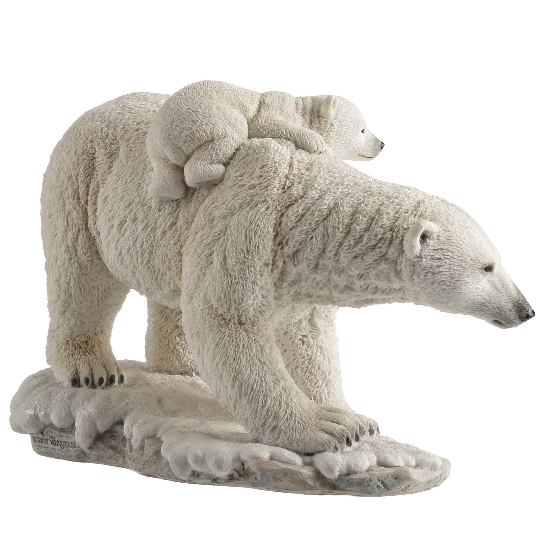 Polar Bear Cub On The Back Of Mother