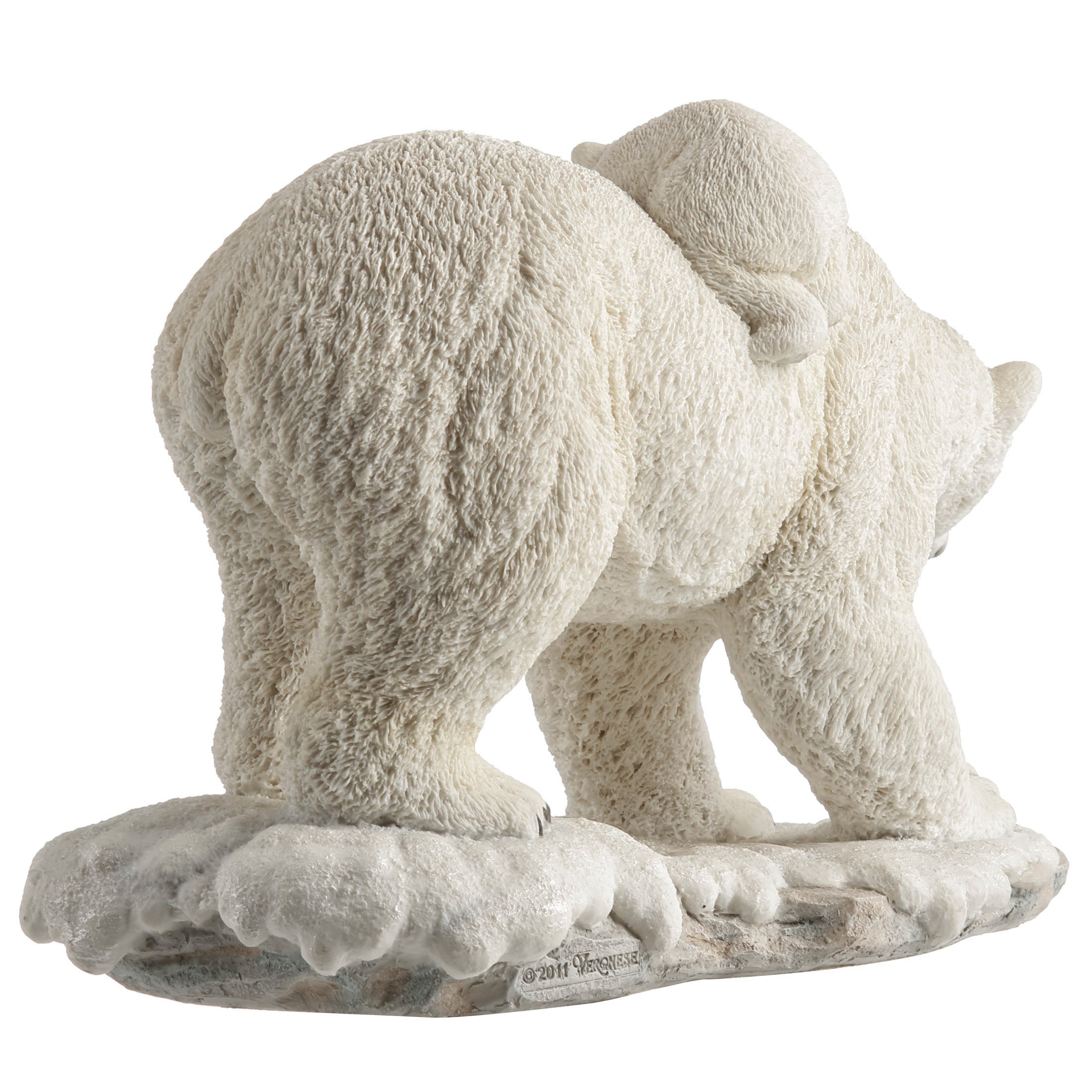Polar Bear Cub On The Back Of Mother