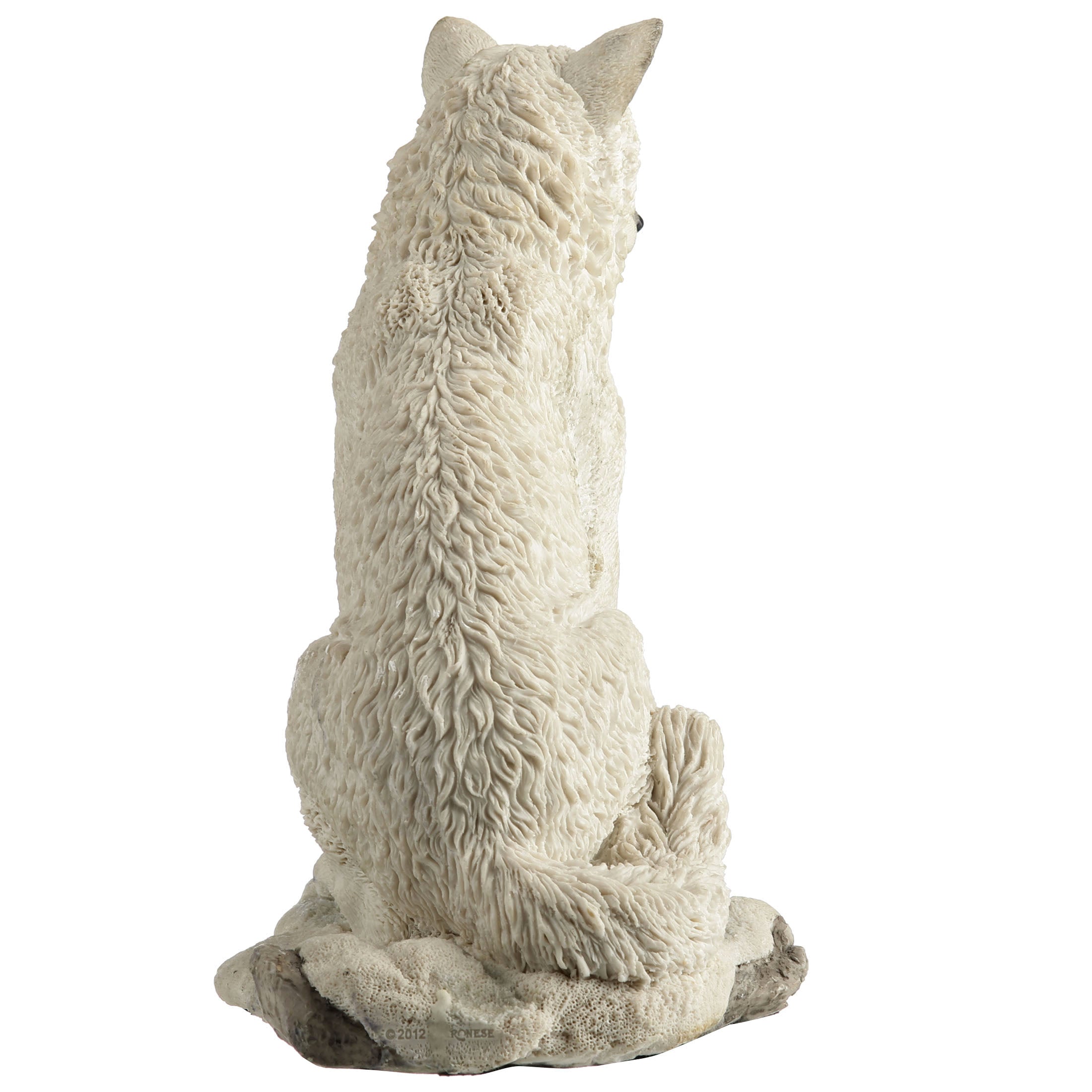 White Wolf Sitting In Snow