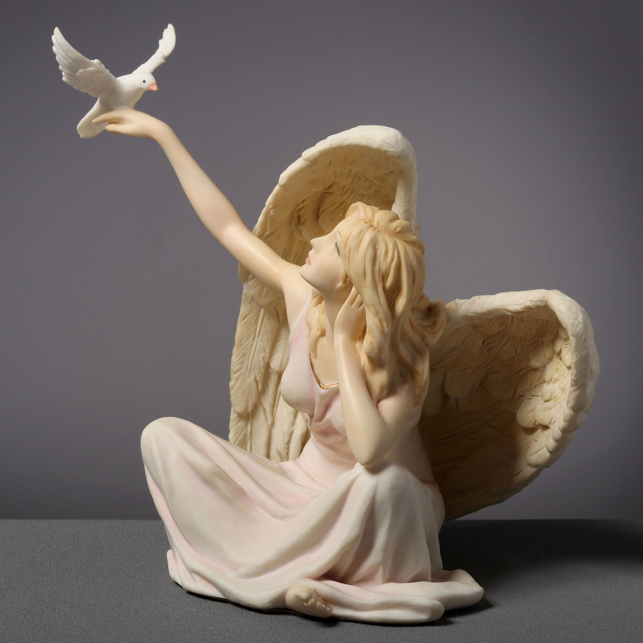 Angel Sitting With Dove On Right Hand (Light Color)