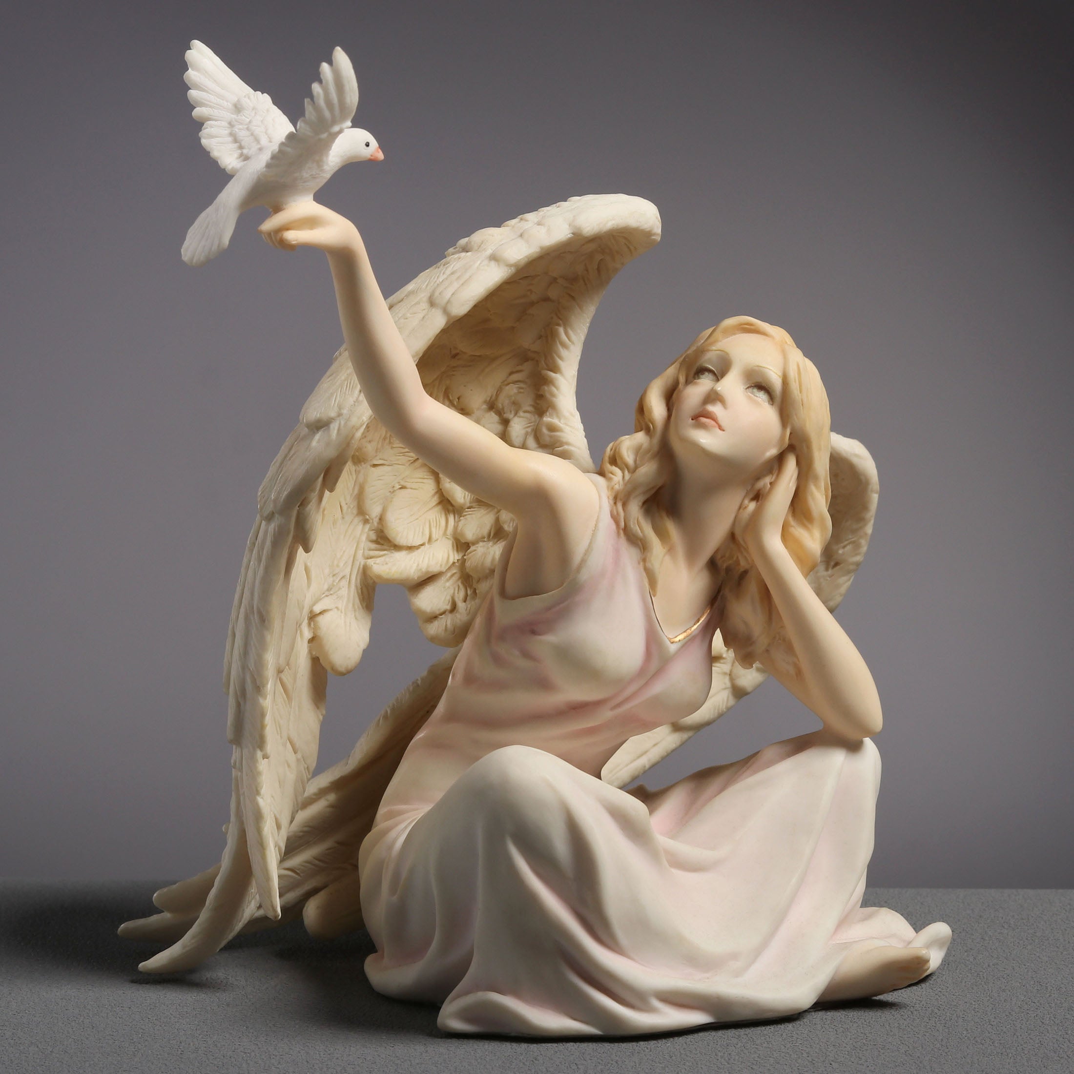 Angel Sitting With Dove On Right Hand (Light Color)