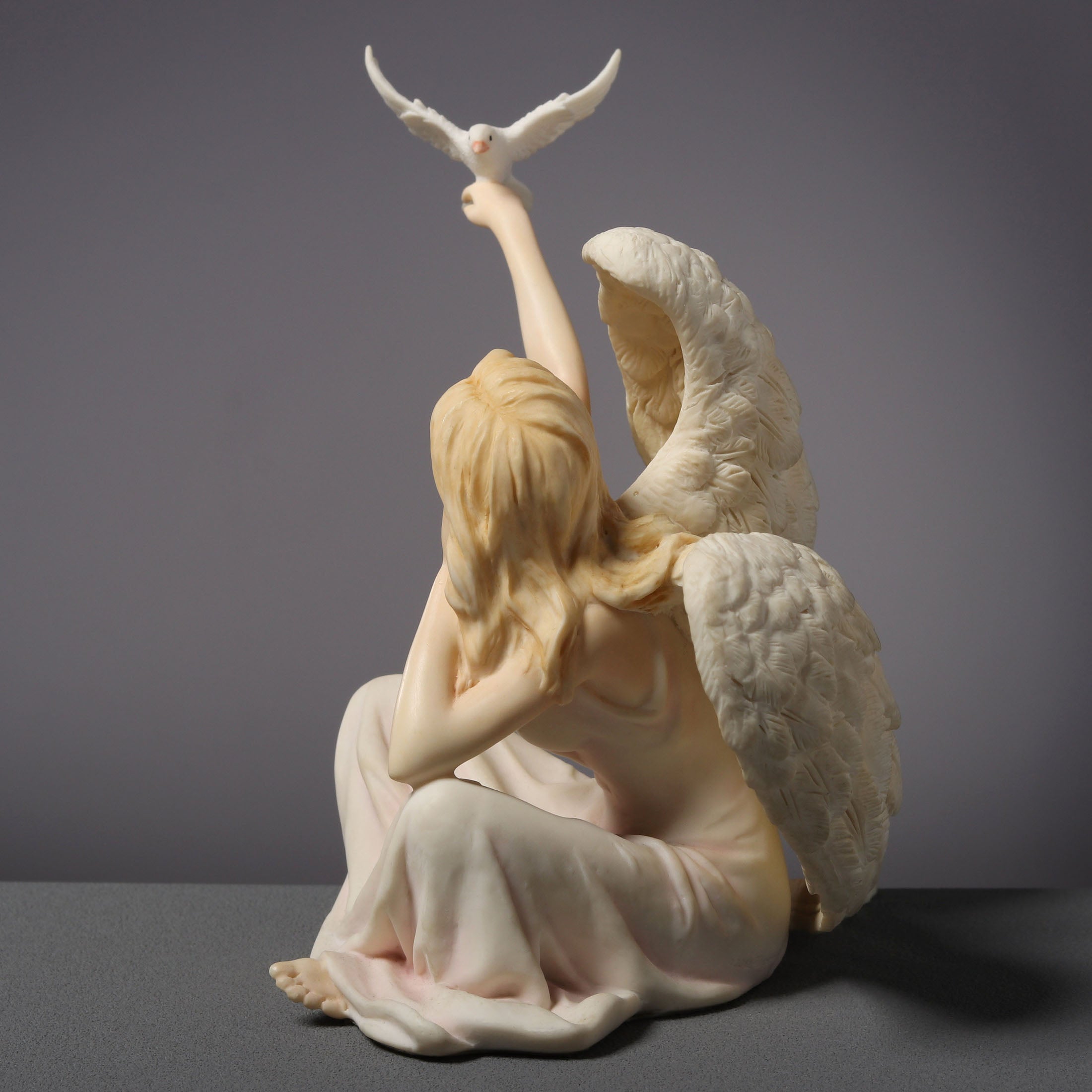 Angel Sitting With Dove On Right Hand (Light Color)