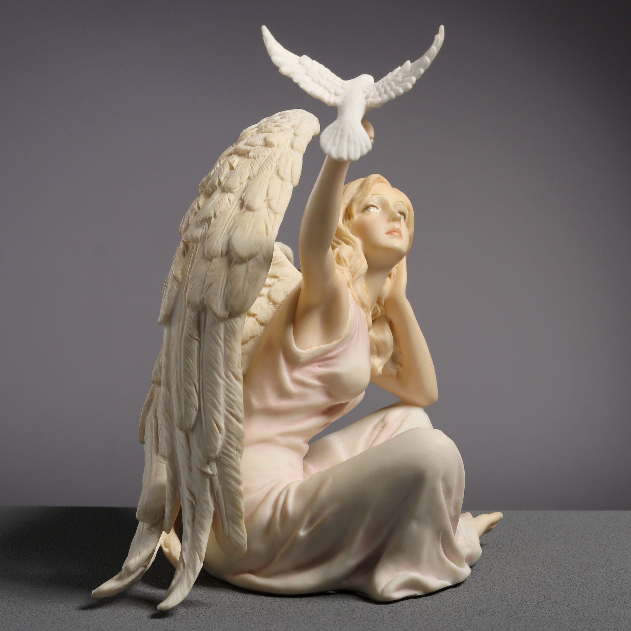 Angel Sitting With Dove On Right Hand (Light Color)
