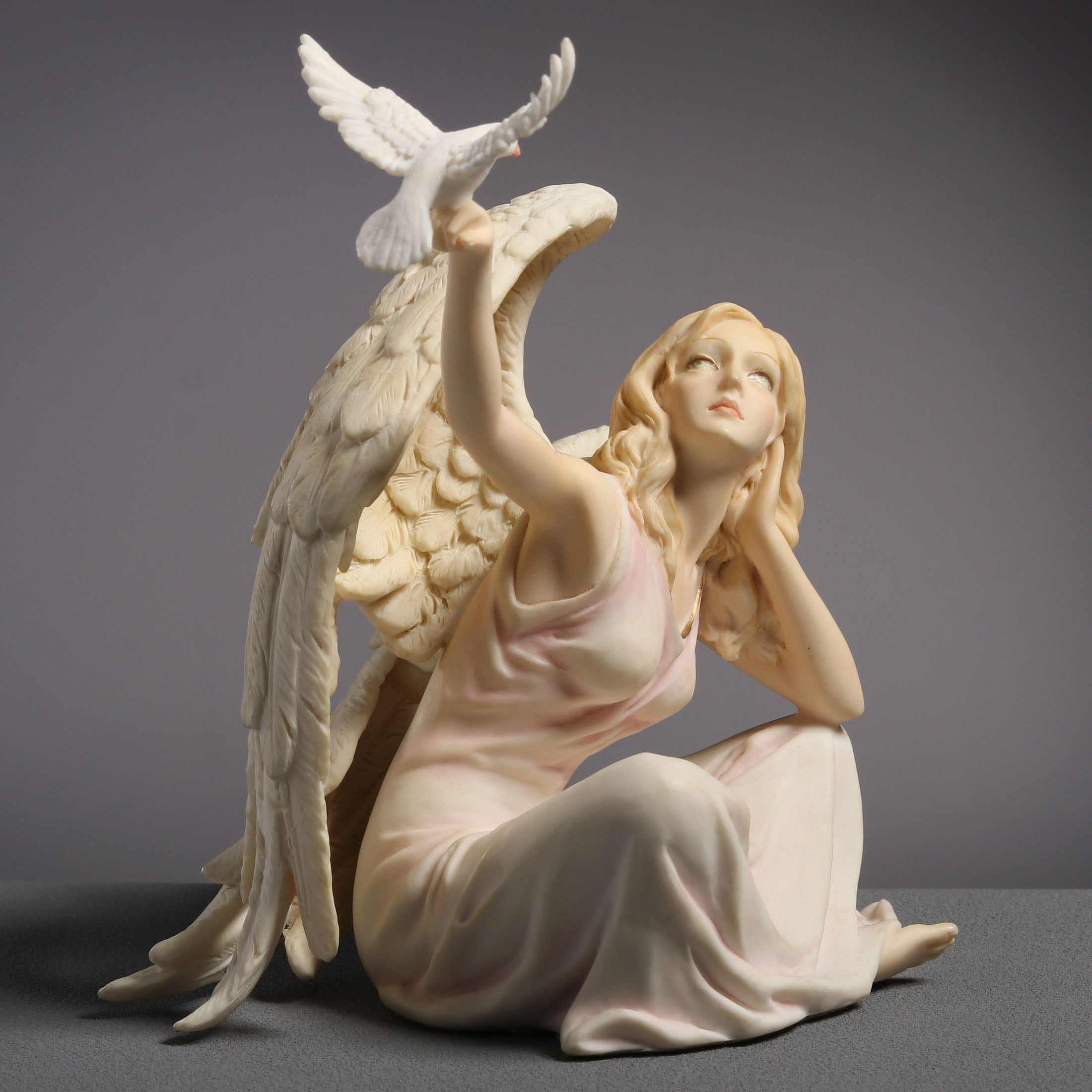 Angel Sitting With Dove On Right Hand (Light Color)