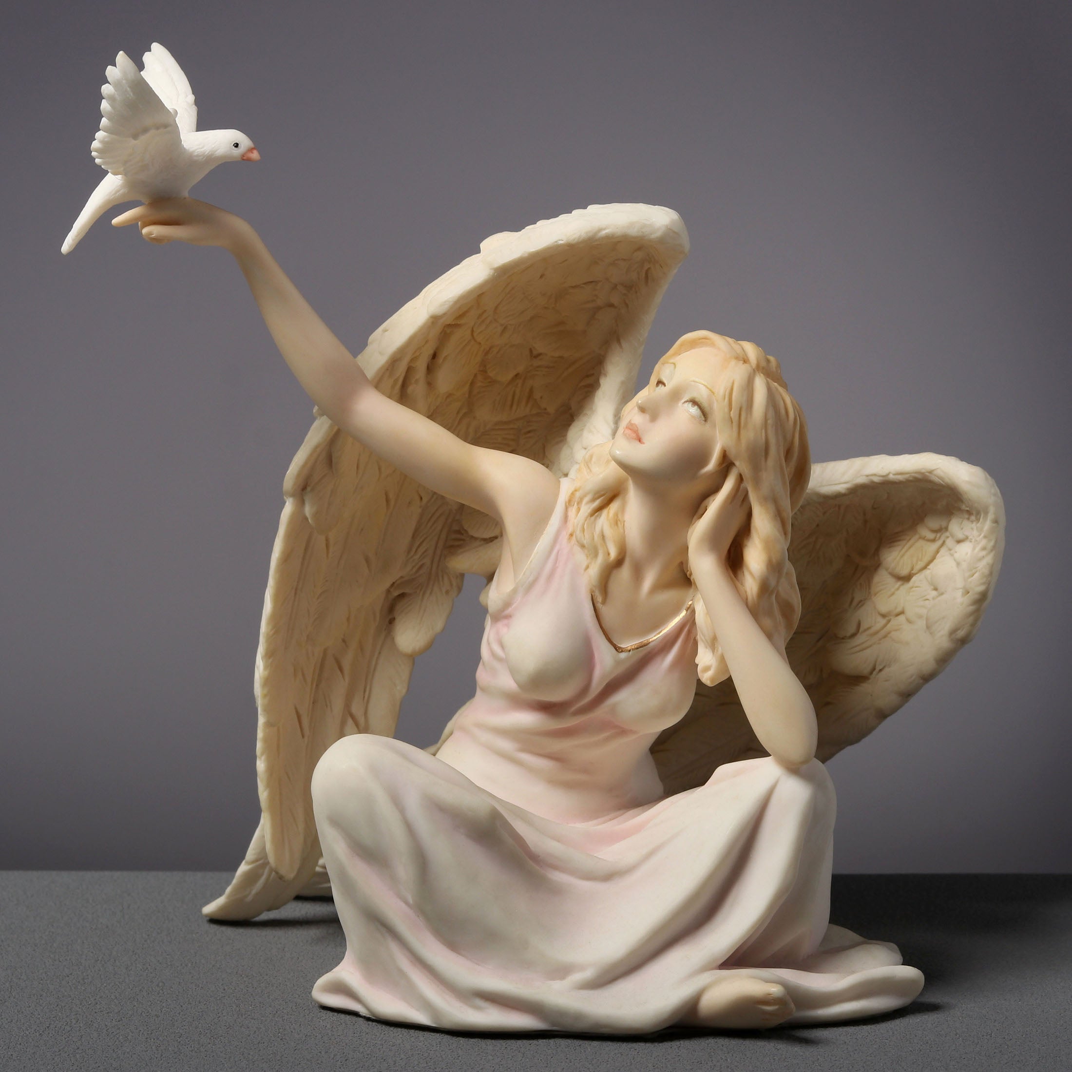 Angel Sitting With Dove On Right Hand (Light Color)