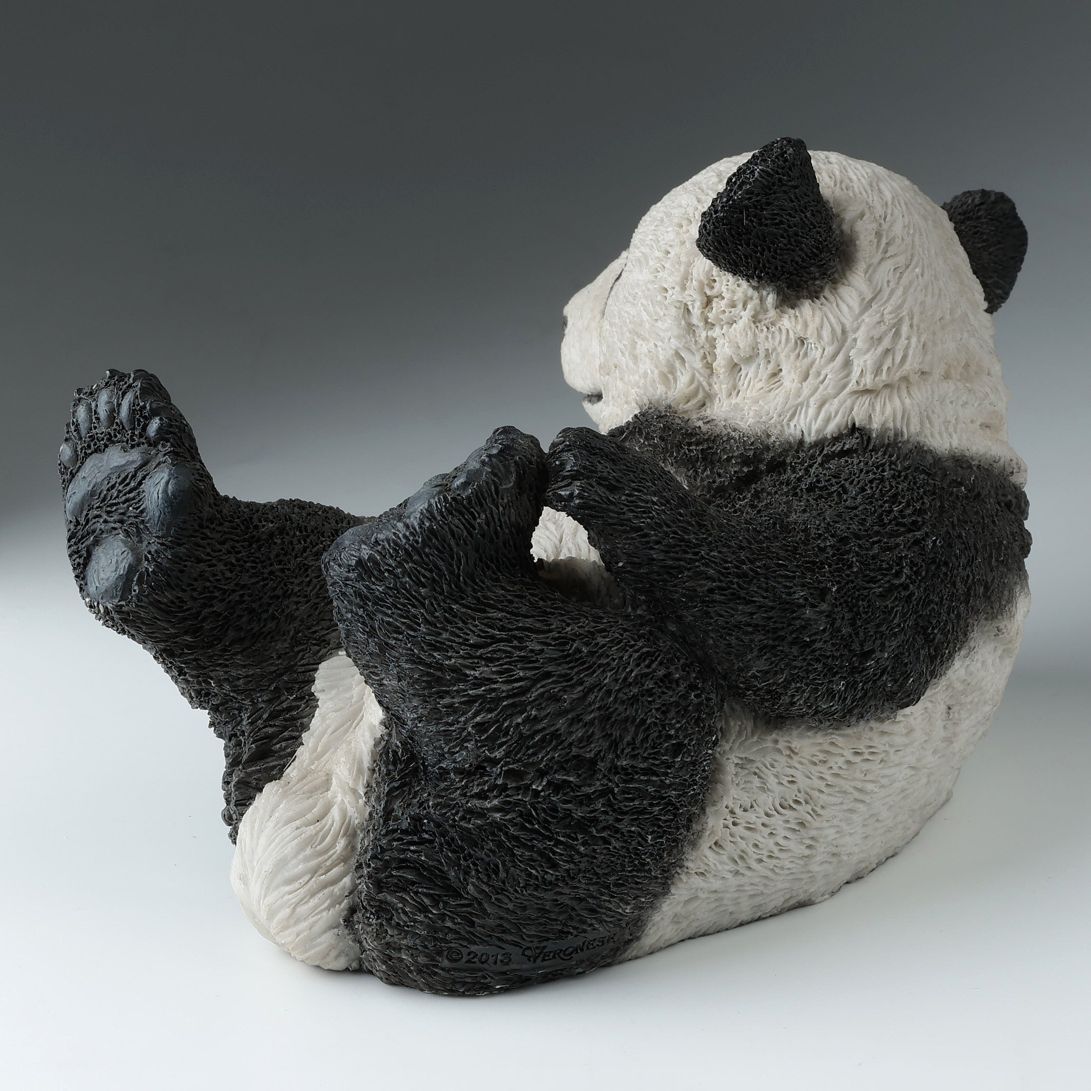 Panda Cub On His Back