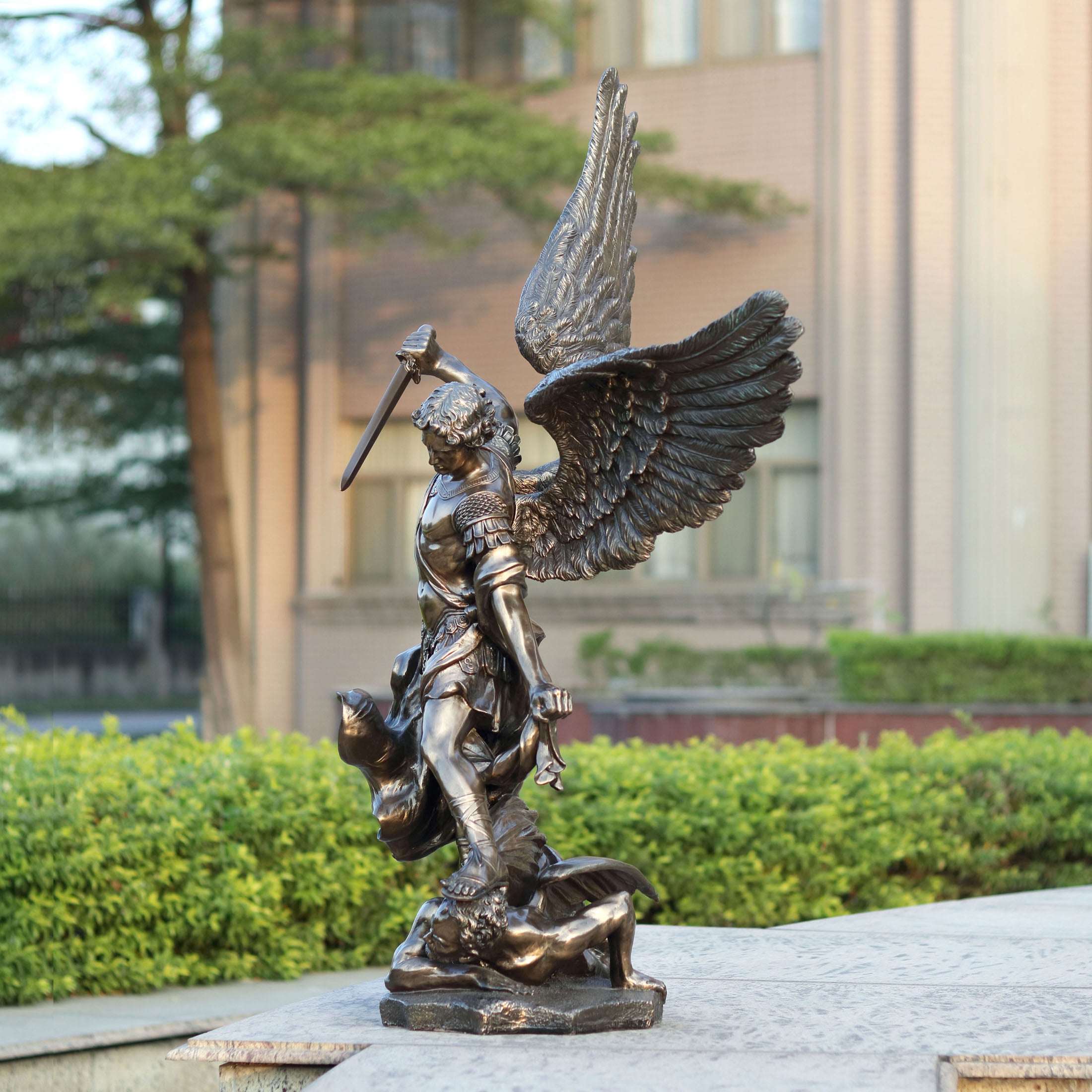 Saint Michael Standing Over Demon With Sword