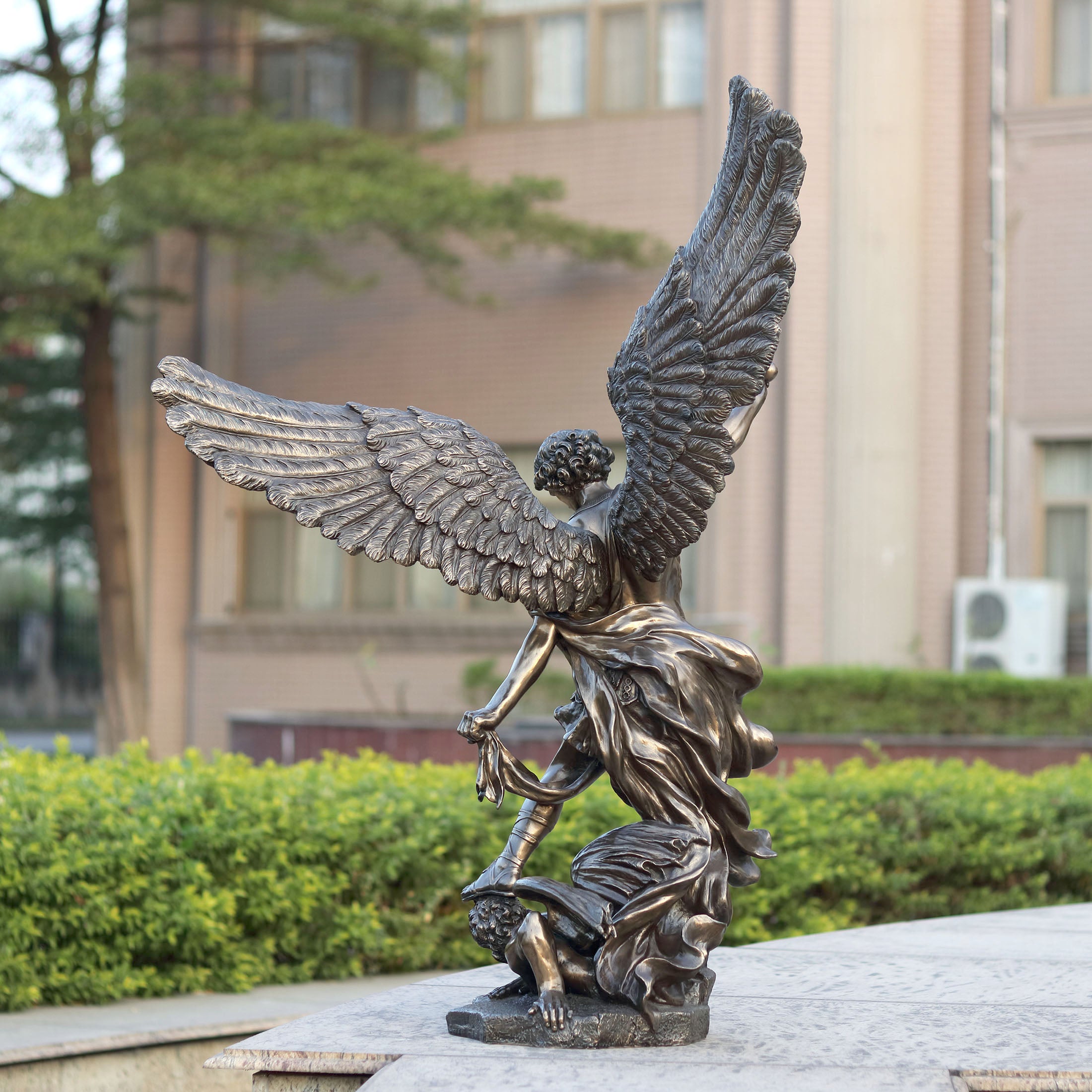 Saint Michael Standing Over Demon With Sword