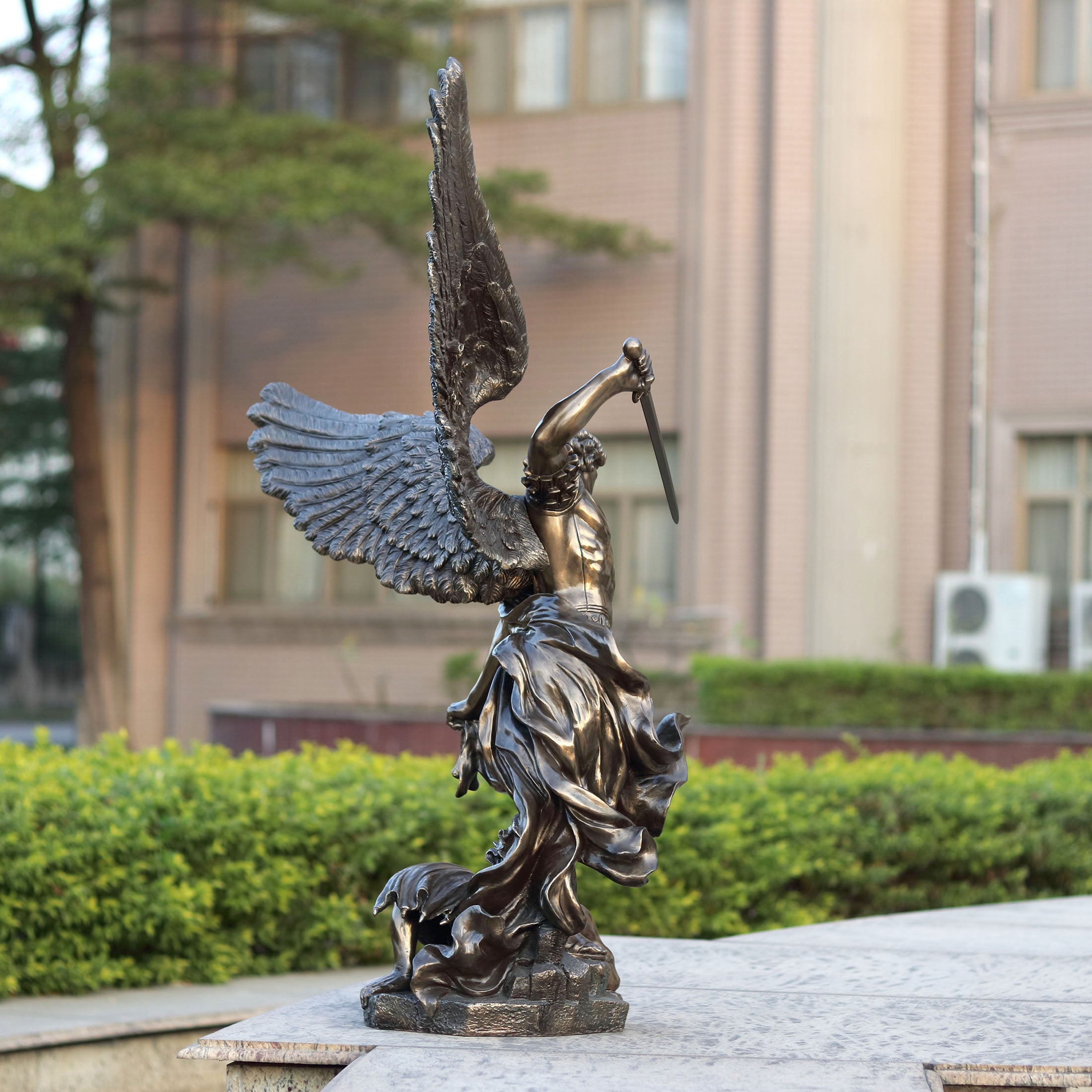 Saint Michael Standing Over Demon With Sword