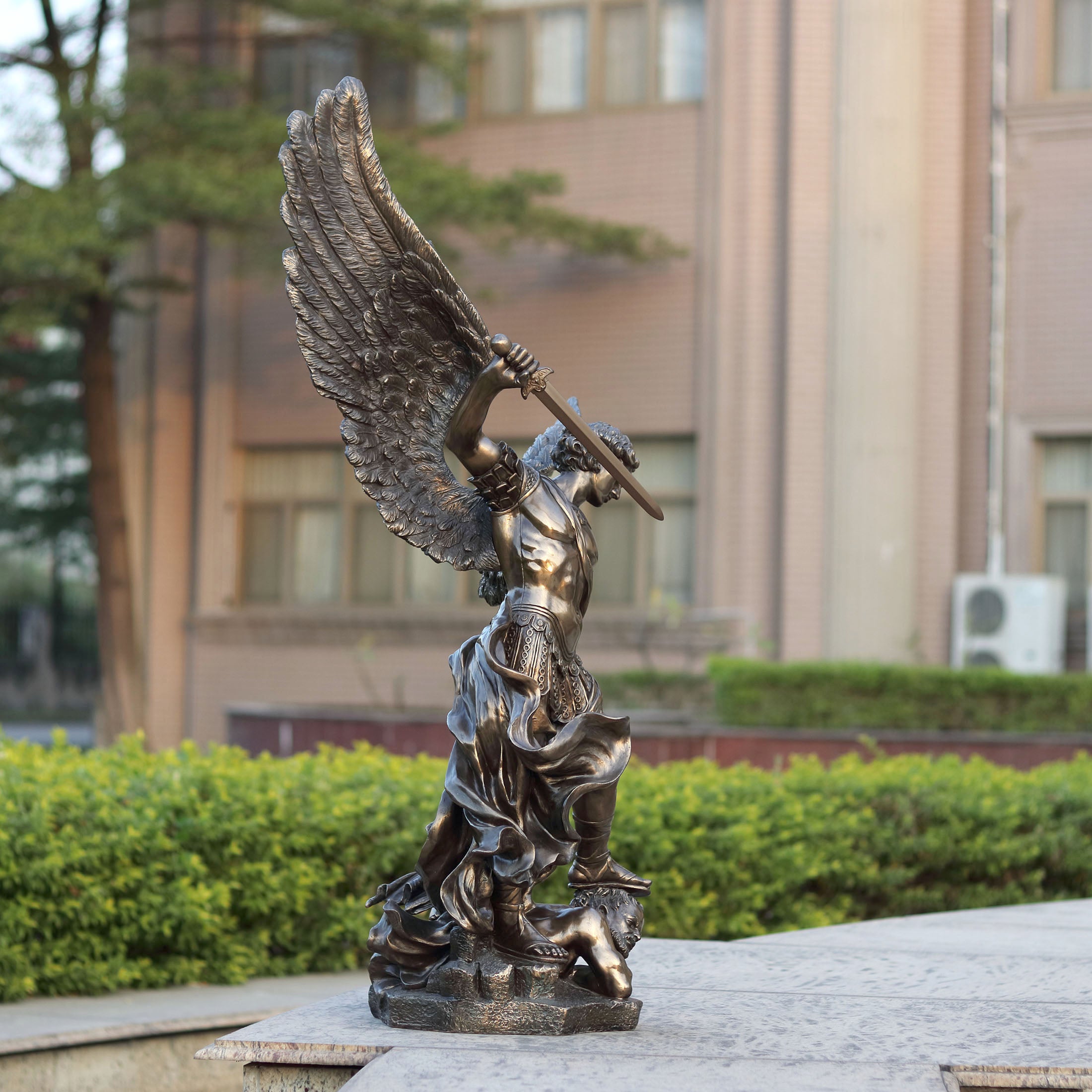 Saint Michael Standing Over Demon With Sword