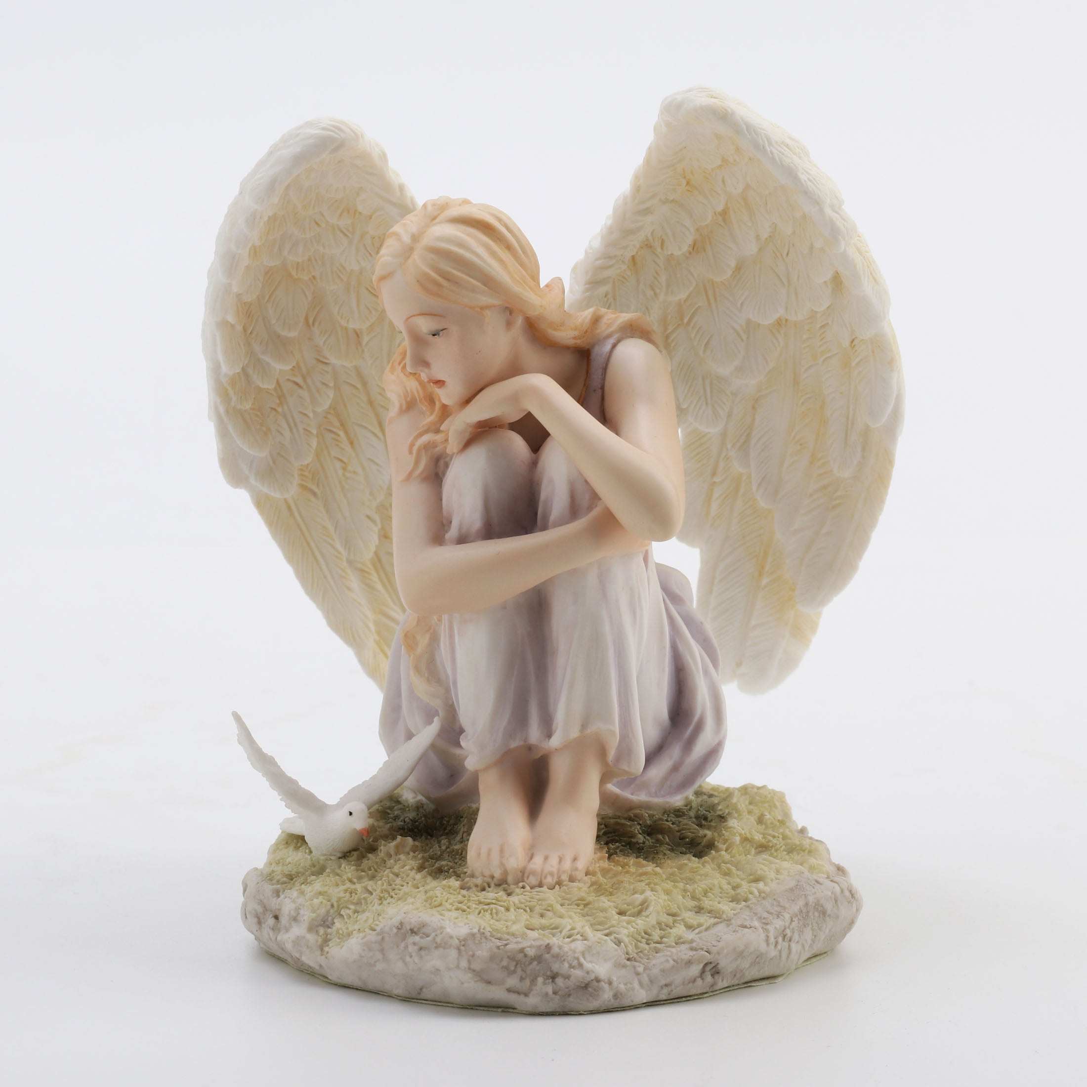Angel Sitting Looking At Dove