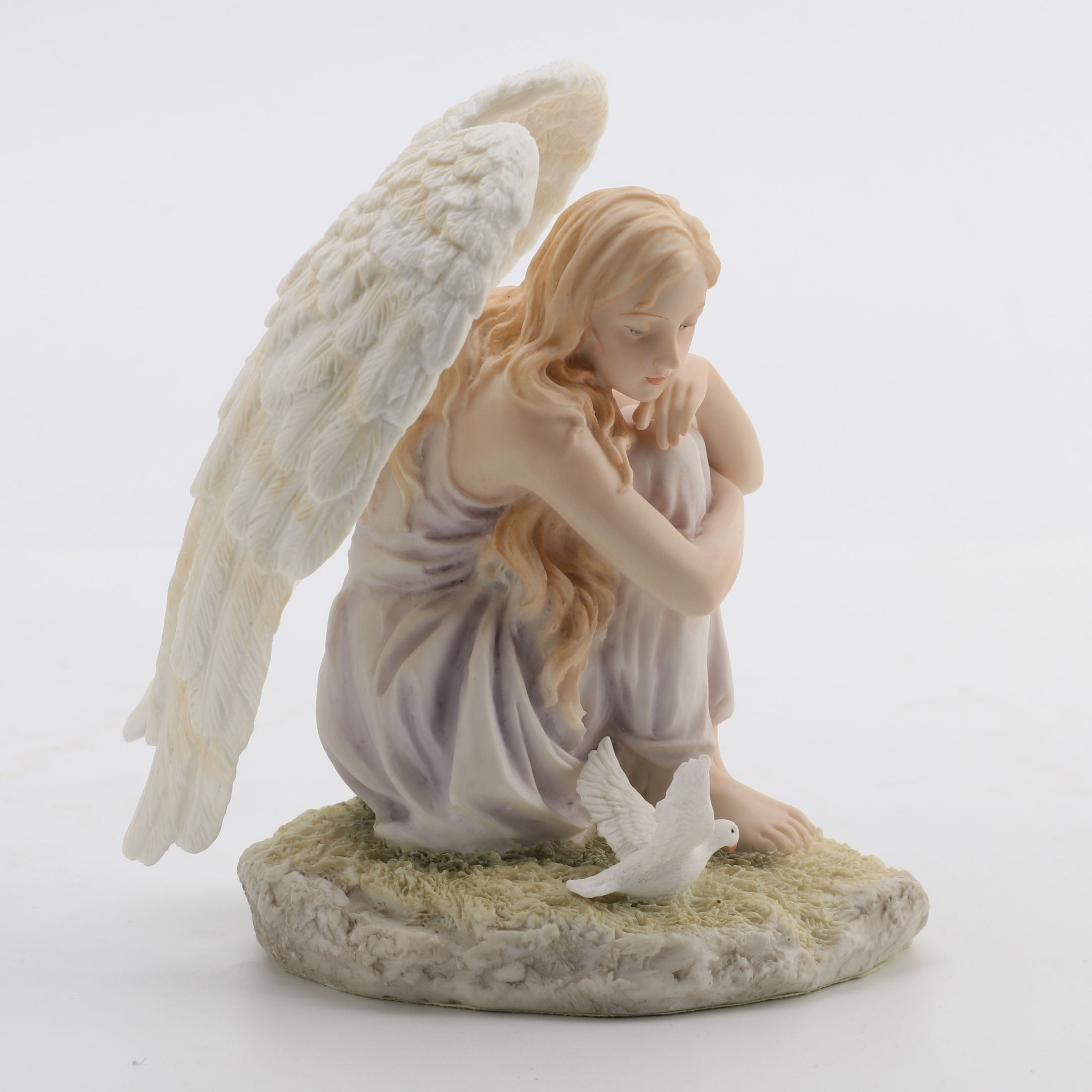 Angel Sitting Looking At Dove