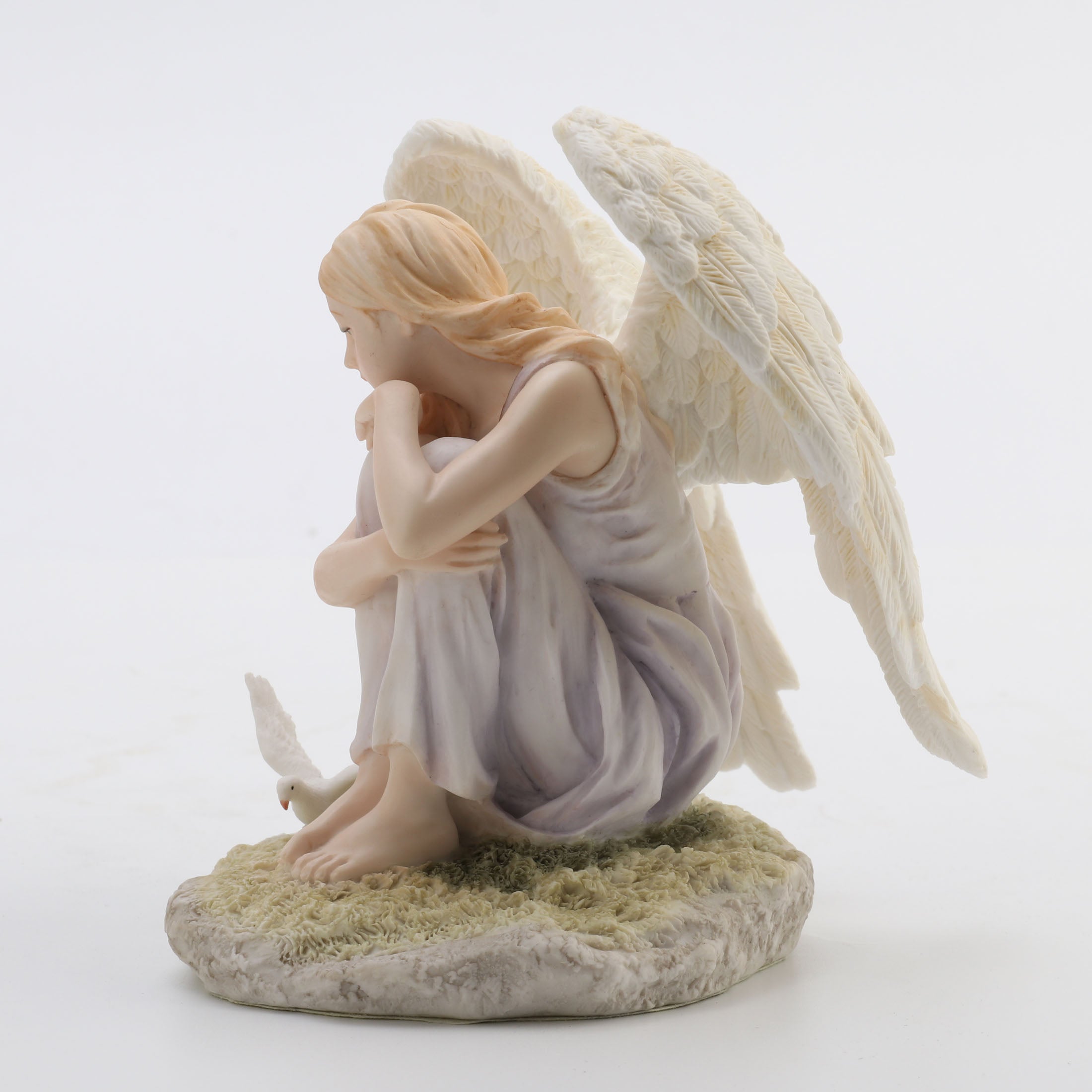 Angel Sitting Looking At Dove