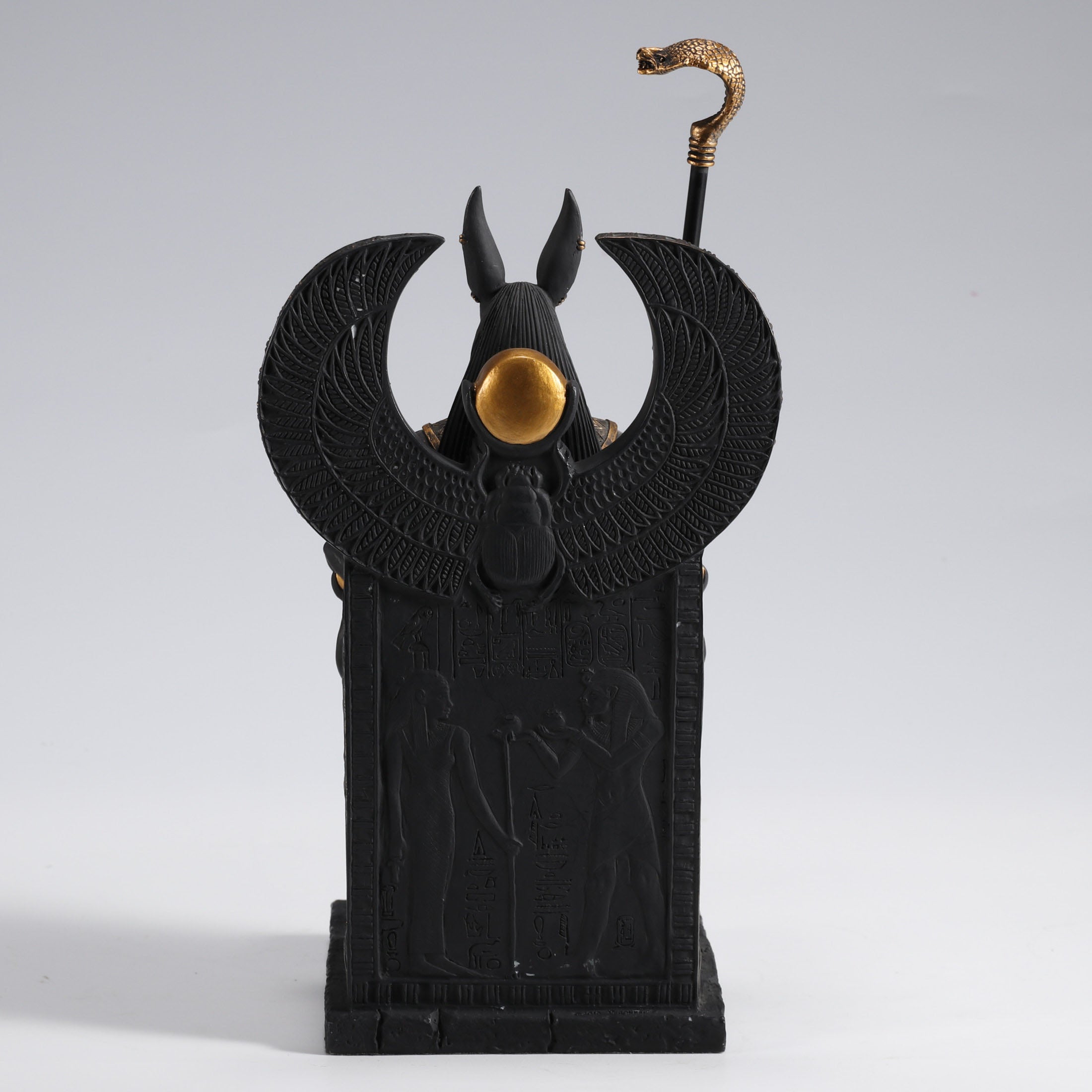 Egyptian God Anubis Sitting In A Throne