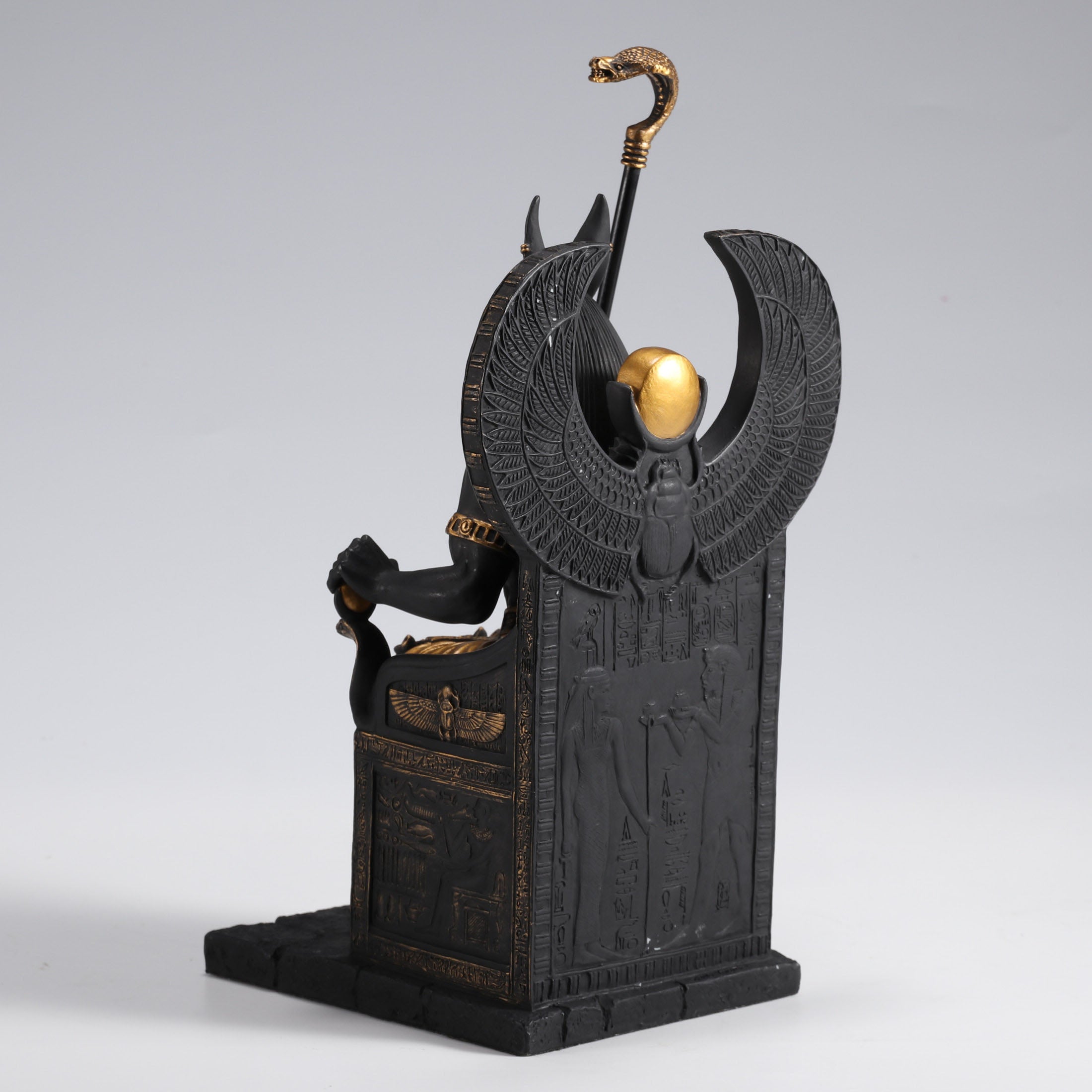 Egyptian God Anubis Sitting In A Throne