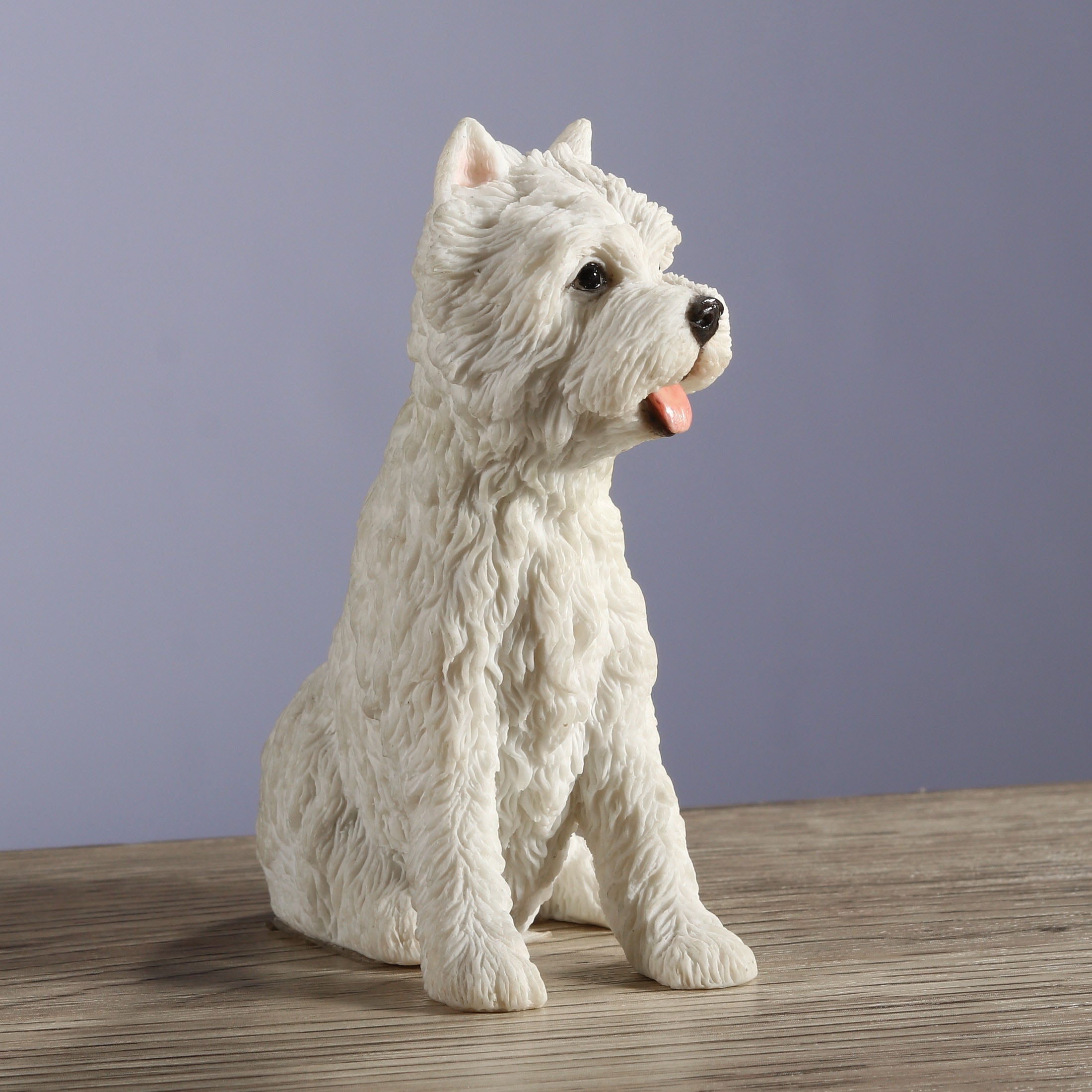 West Highland White Terrier Sitting