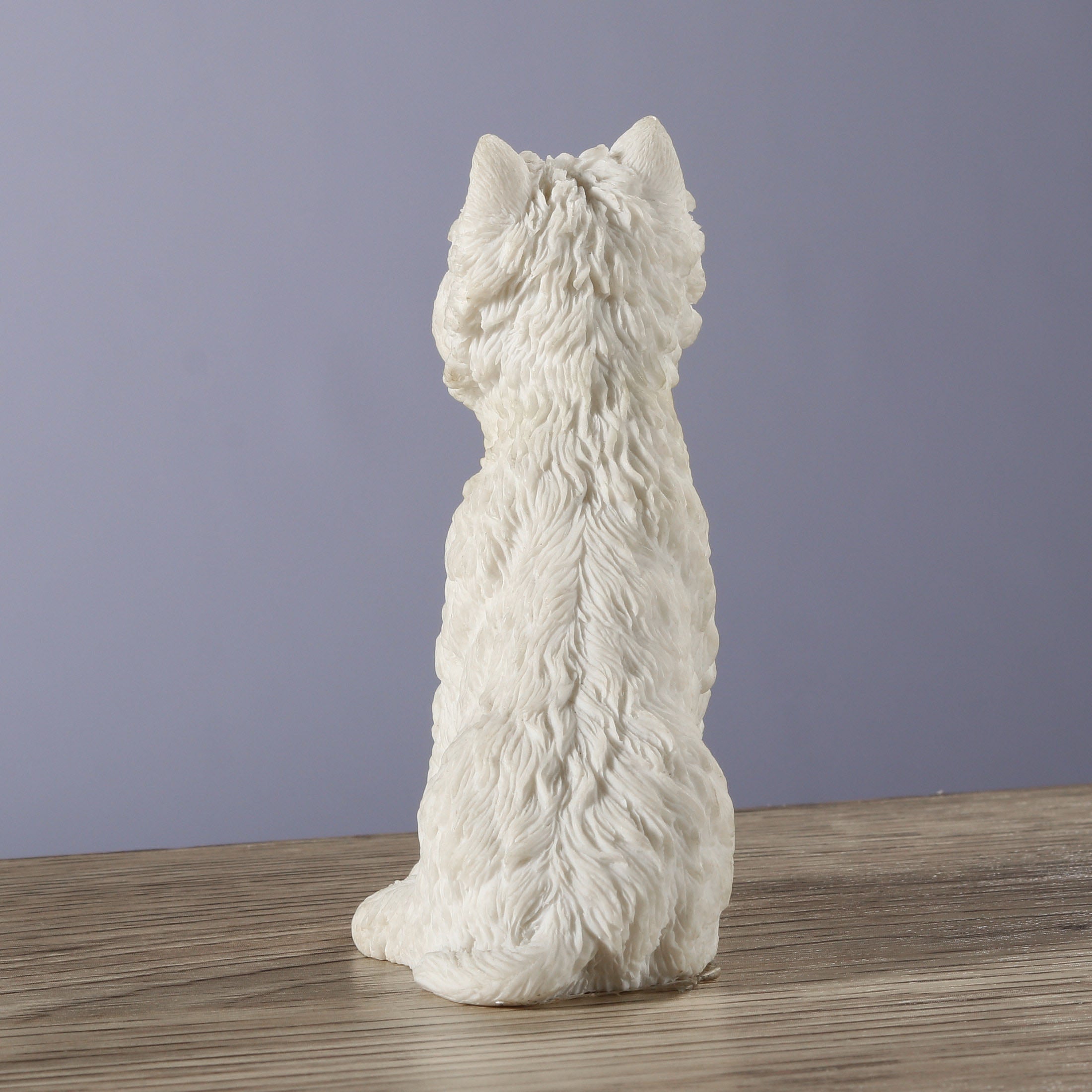 West Highland White Terrier Sitting