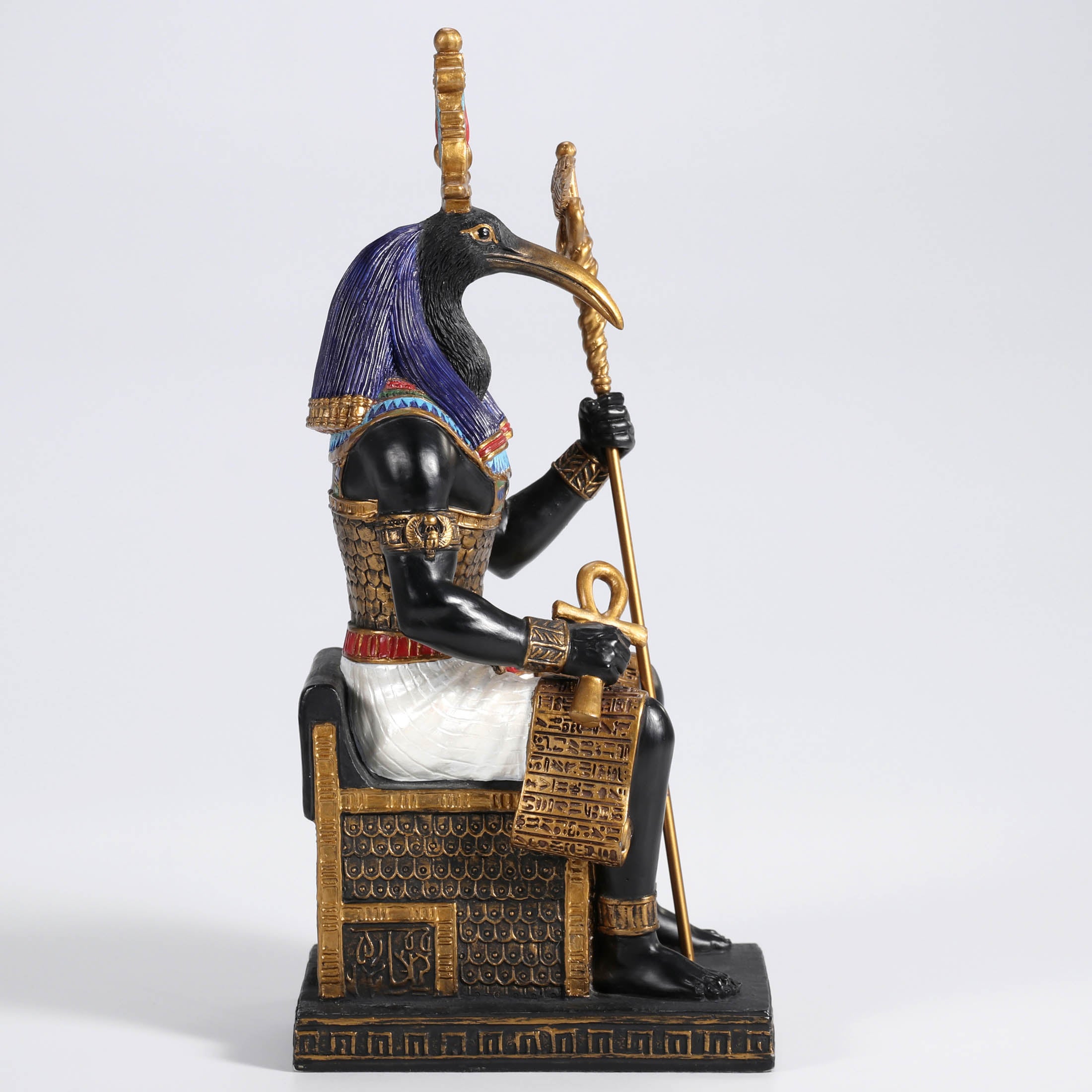 Thoth The Egyptian God Of Wisdom Sitting In His Throne