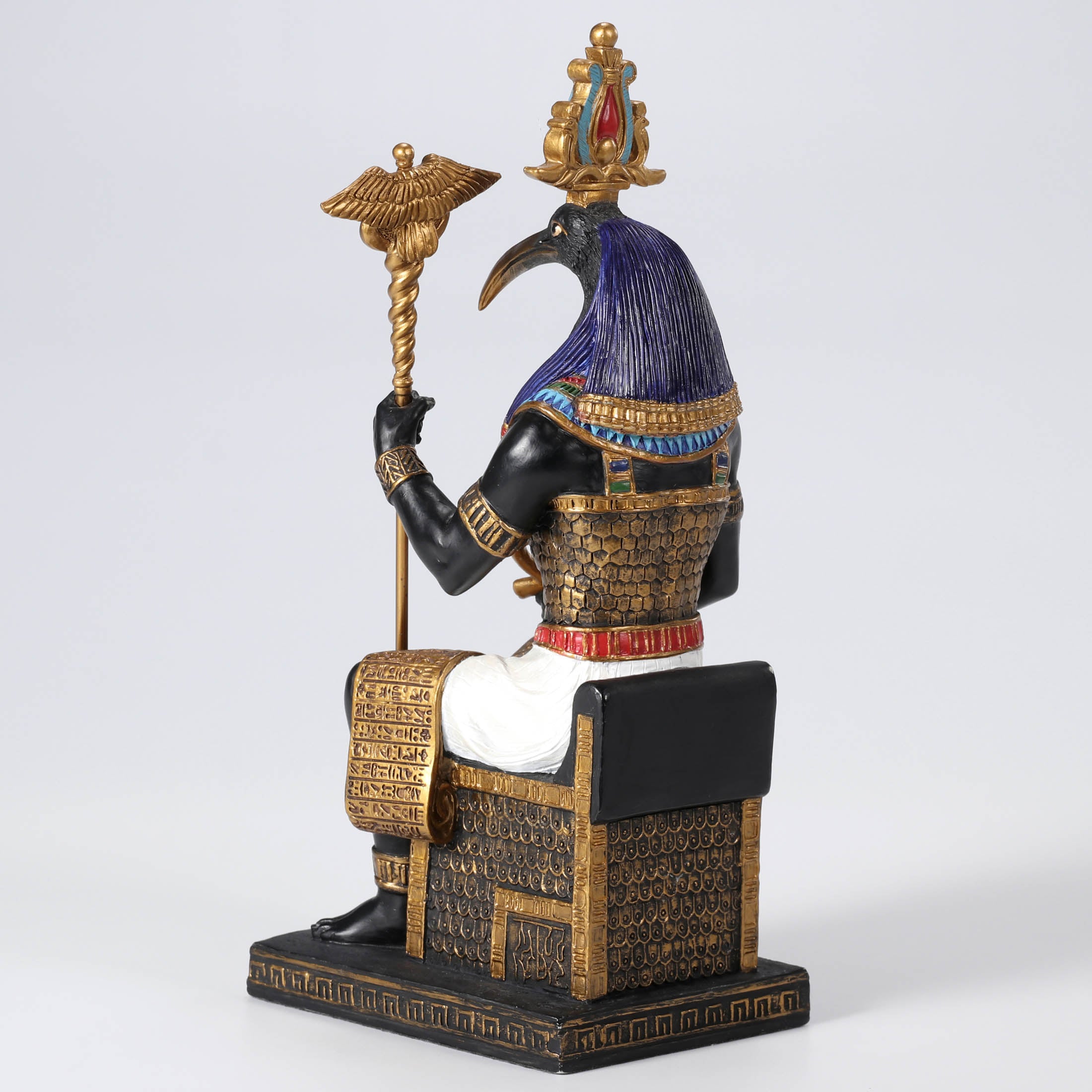Thoth The Egyptian God Of Wisdom Sitting In His Throne