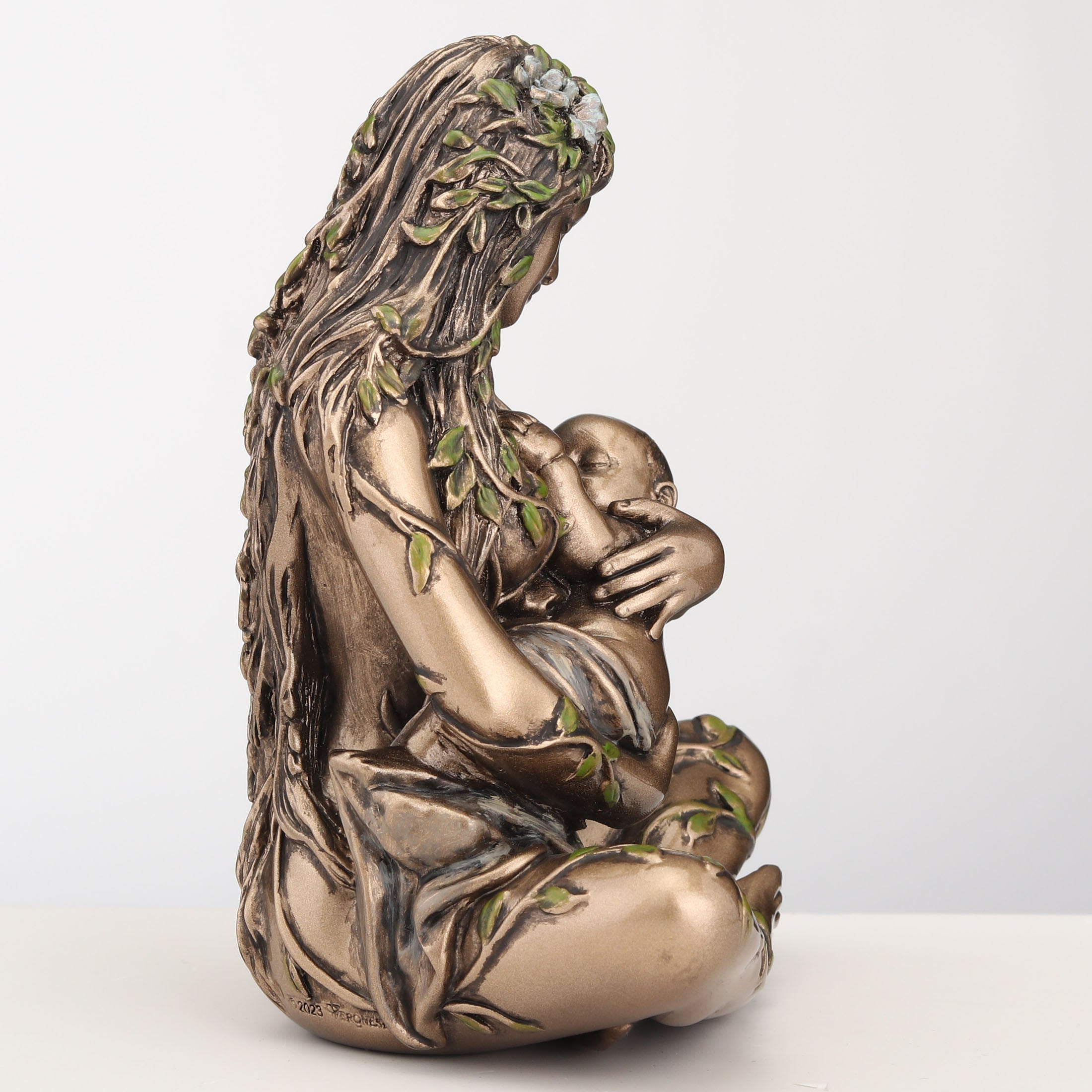 Mother Earth Gaia Nurturing Baby Cradle Position