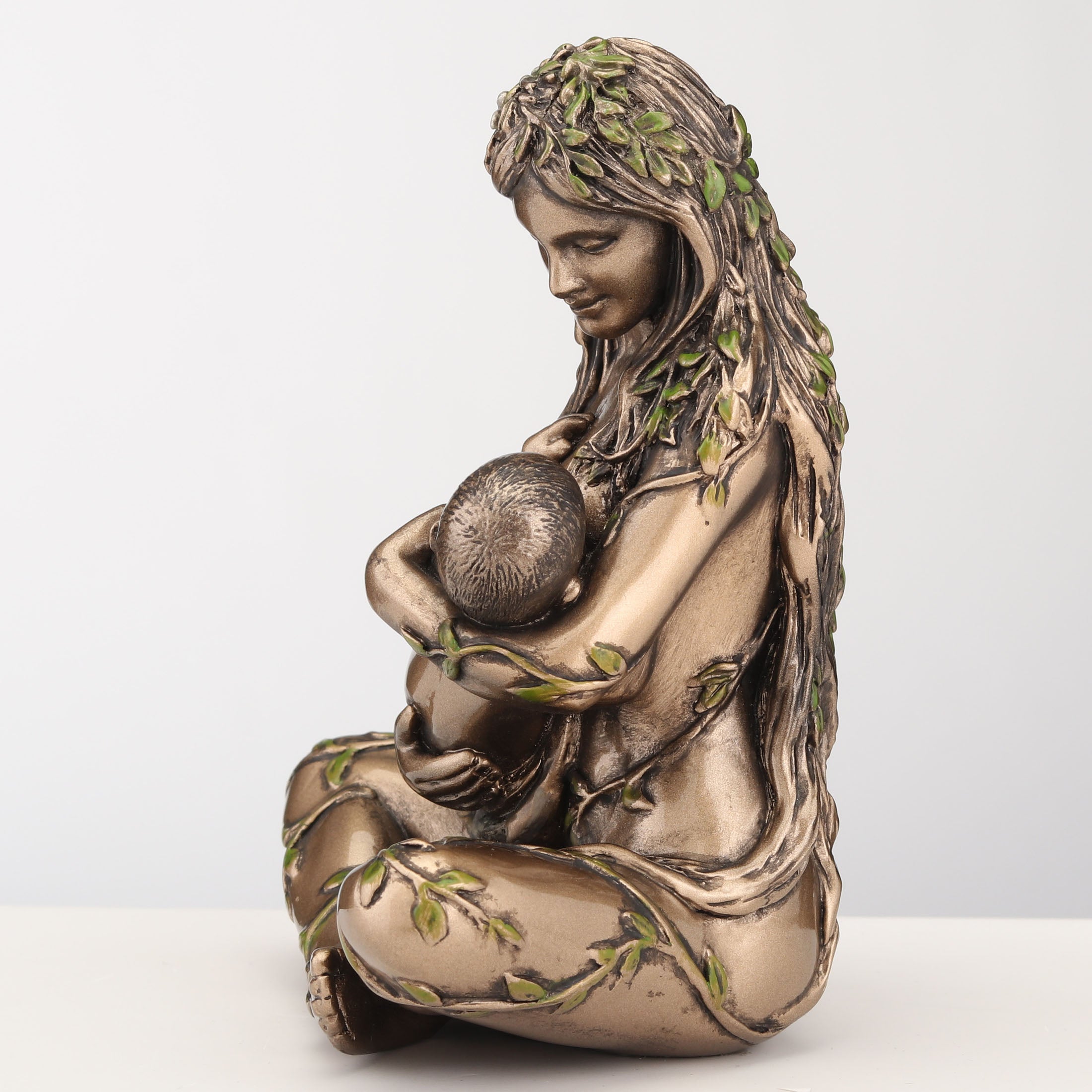 Mother Earth Gaia Nurturing Baby Cradle Position