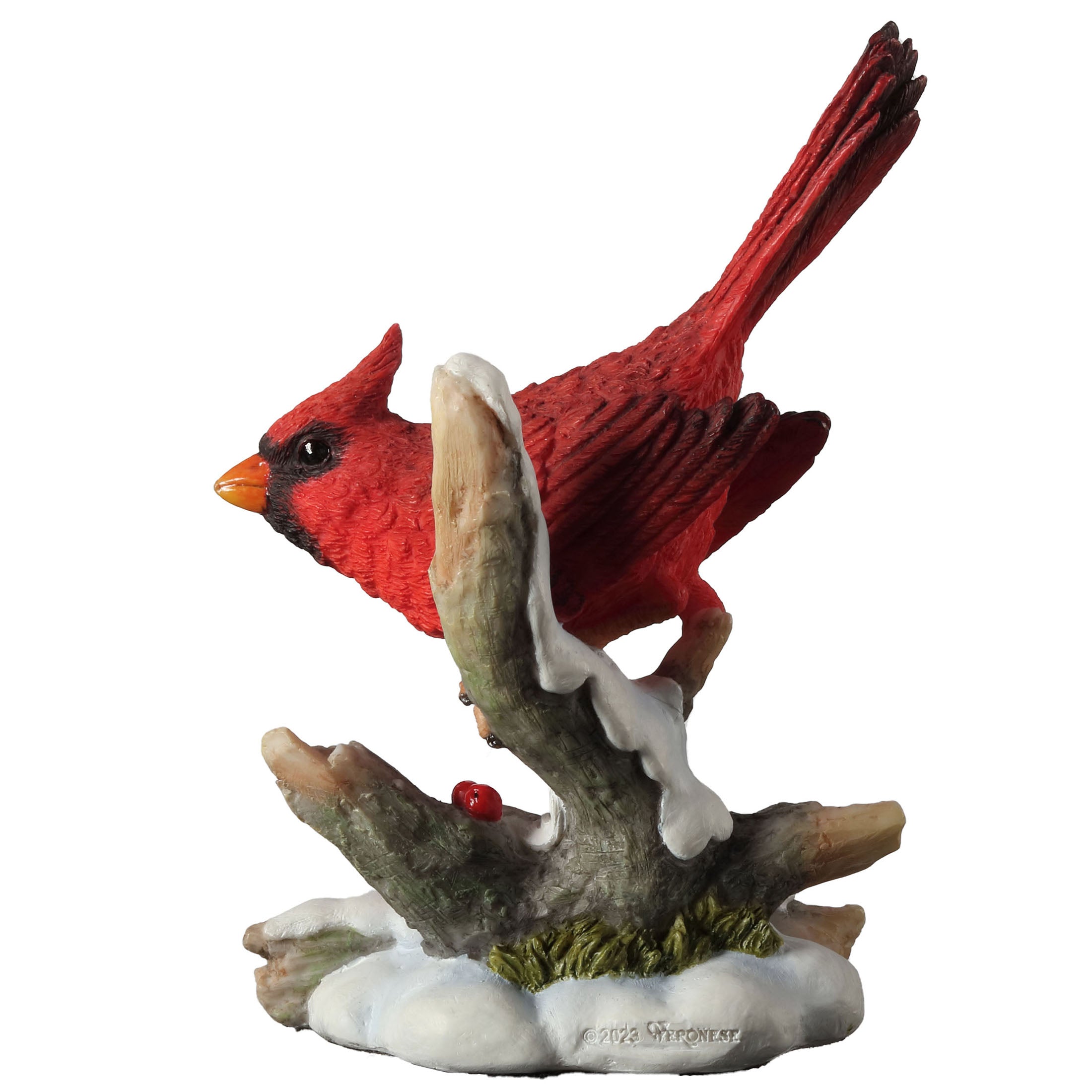 Cardinal Perching On Snowy Branch With Red Berries