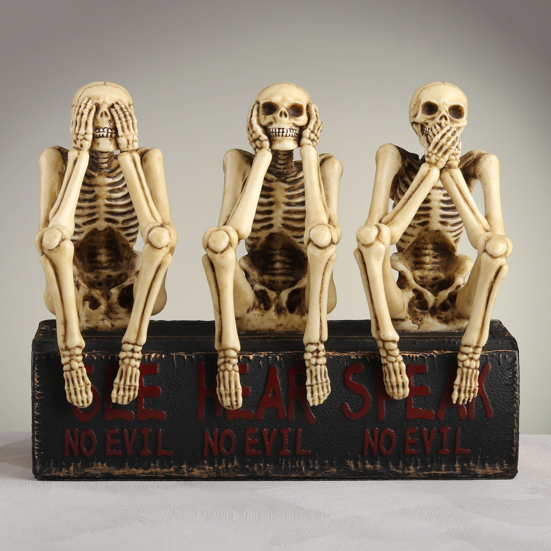 See No Evil Hear No Evil Speak No Evil Skeletons Sitting On Book