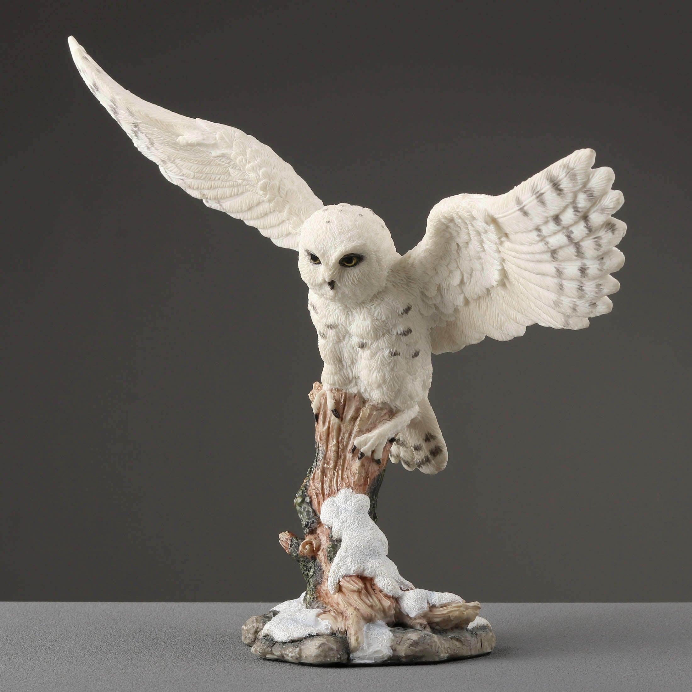 Snowy Owl Spread Wings Perching On Branch