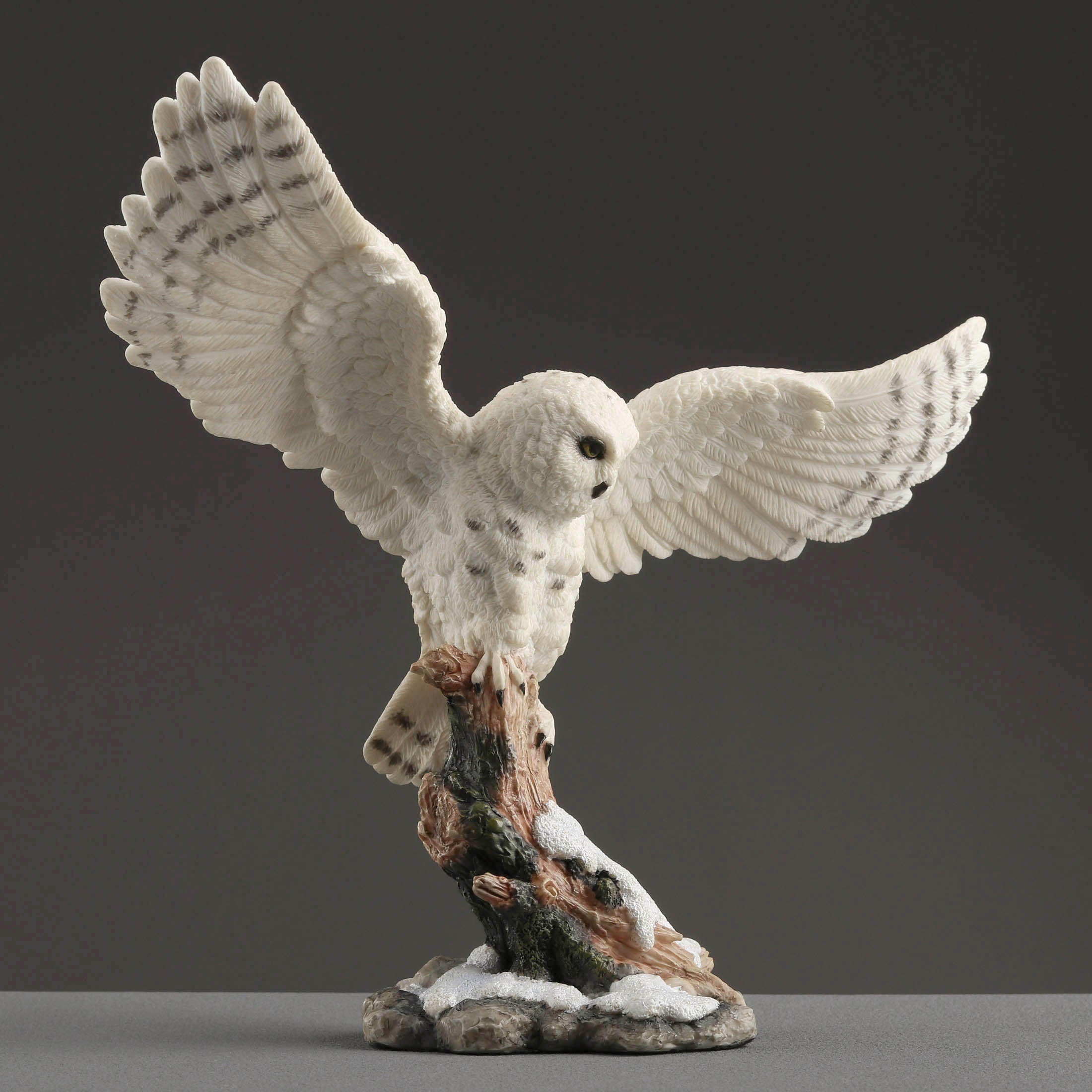 Snowy Owl Spread Wings Perching On Branch