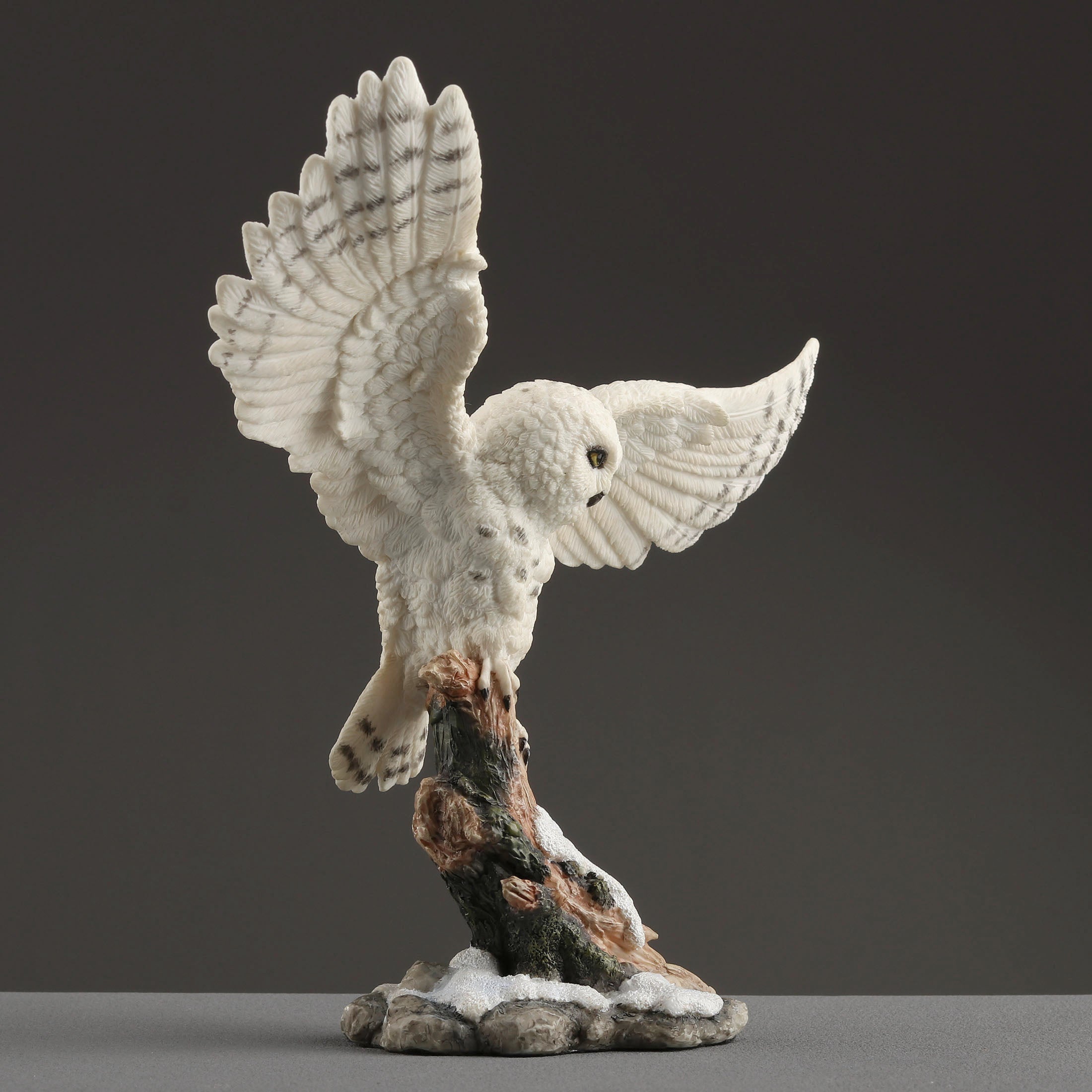 Snowy Owl Spread Wings Perching On Branch