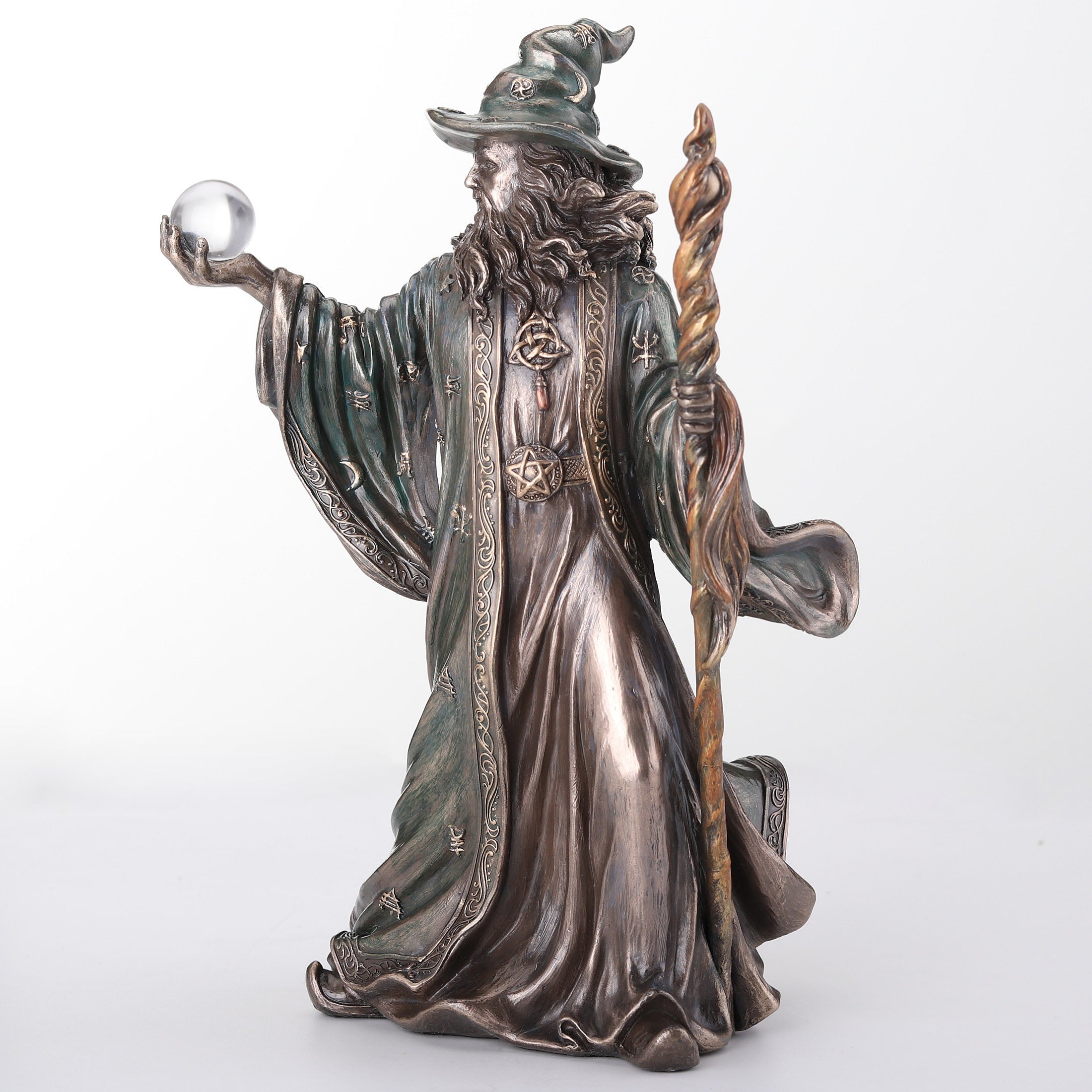 Wizard Holding Crystal Ball And Staff