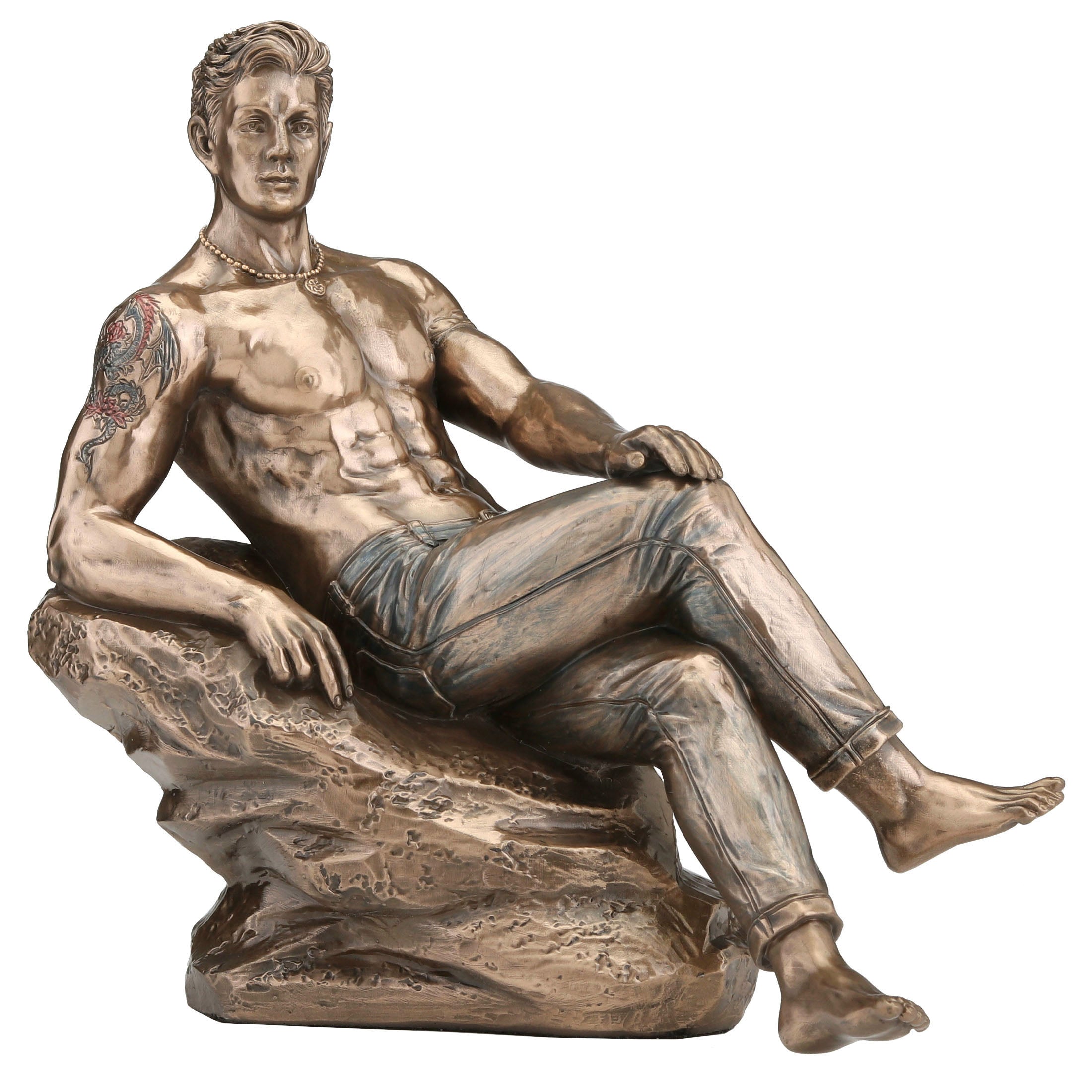 Tattooed Male In Jeans Pin Up Crossed Legs Lean On Rock