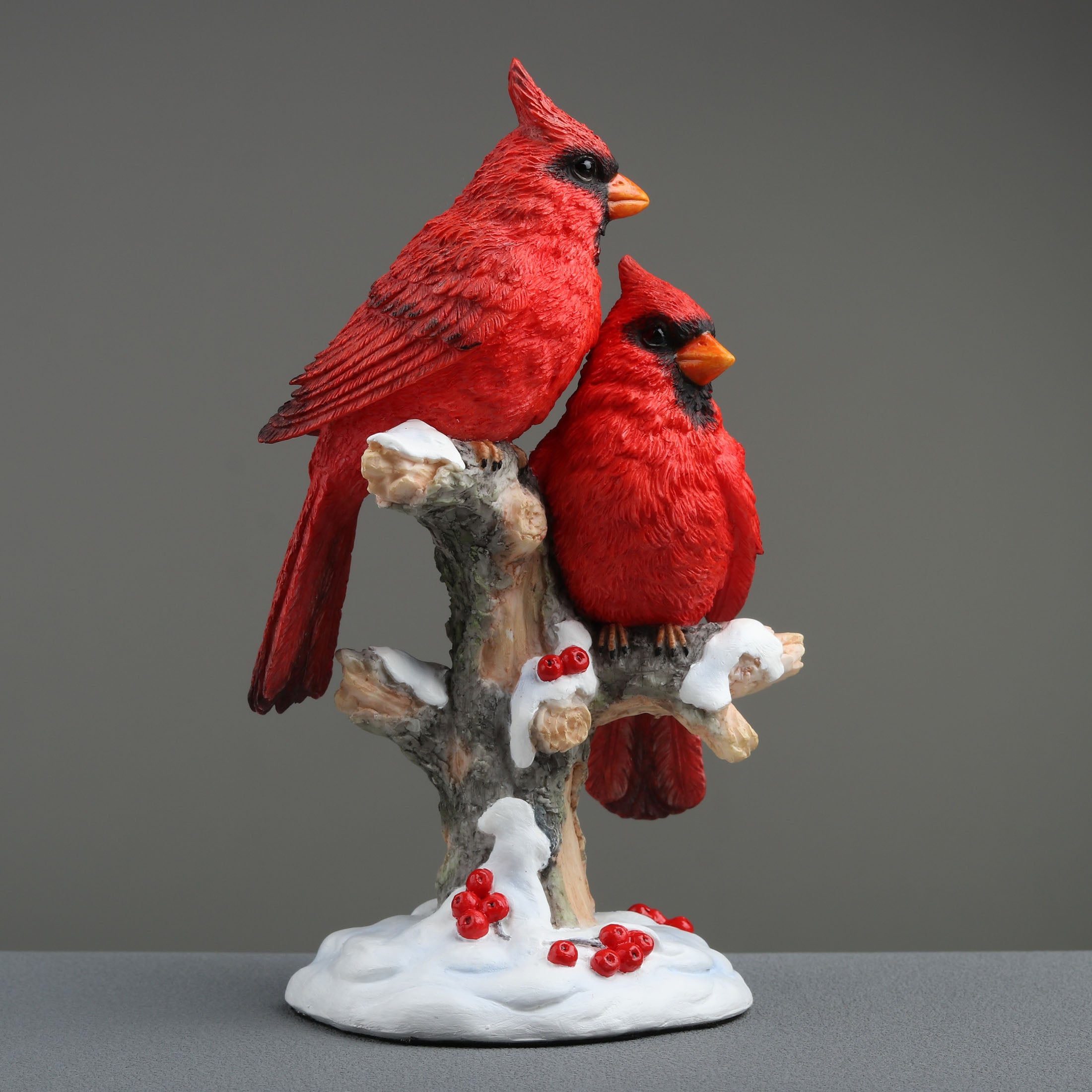 Twin Cardinal Perching On Snow Covered Branch