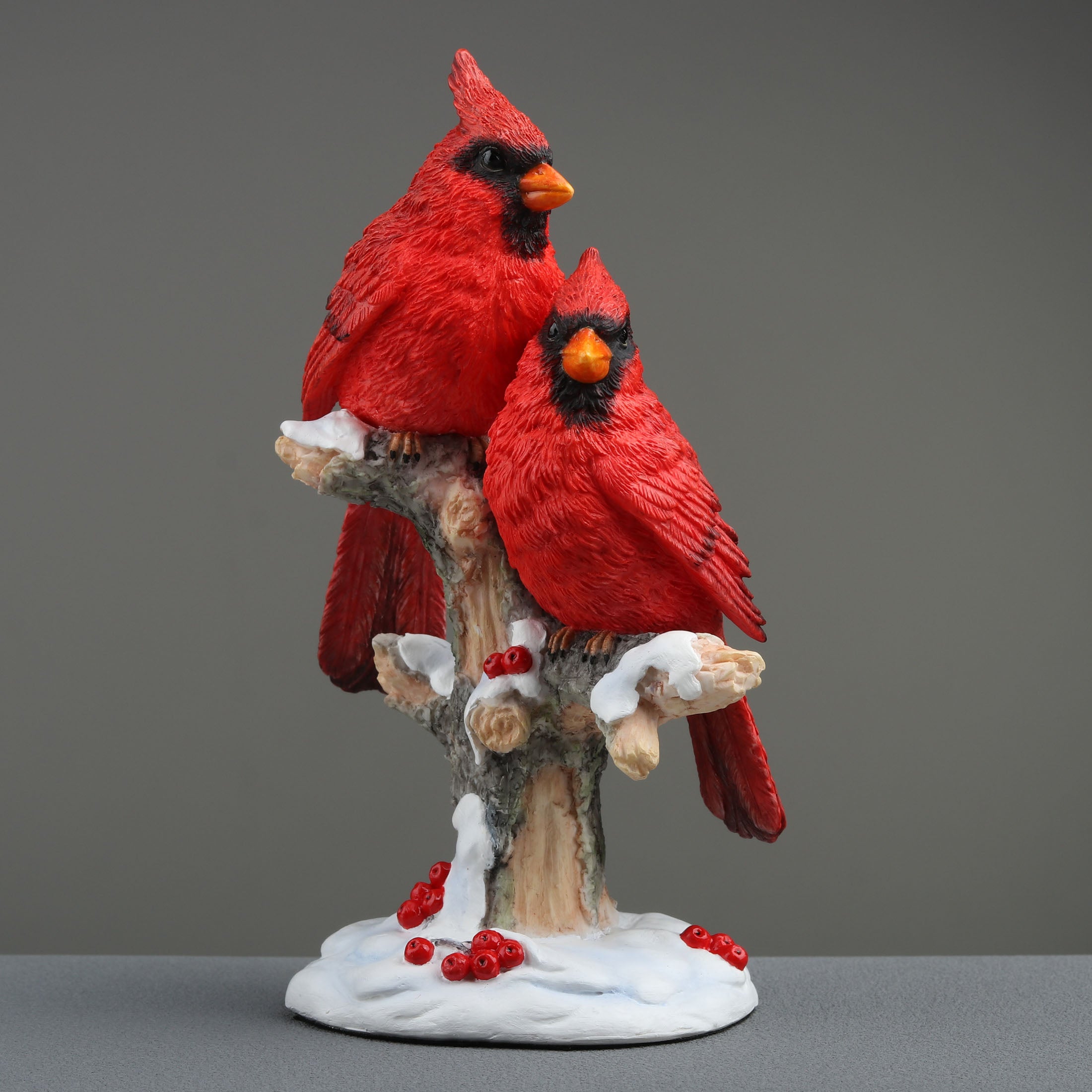 Twin Cardinal Perching On Snow Covered Branch