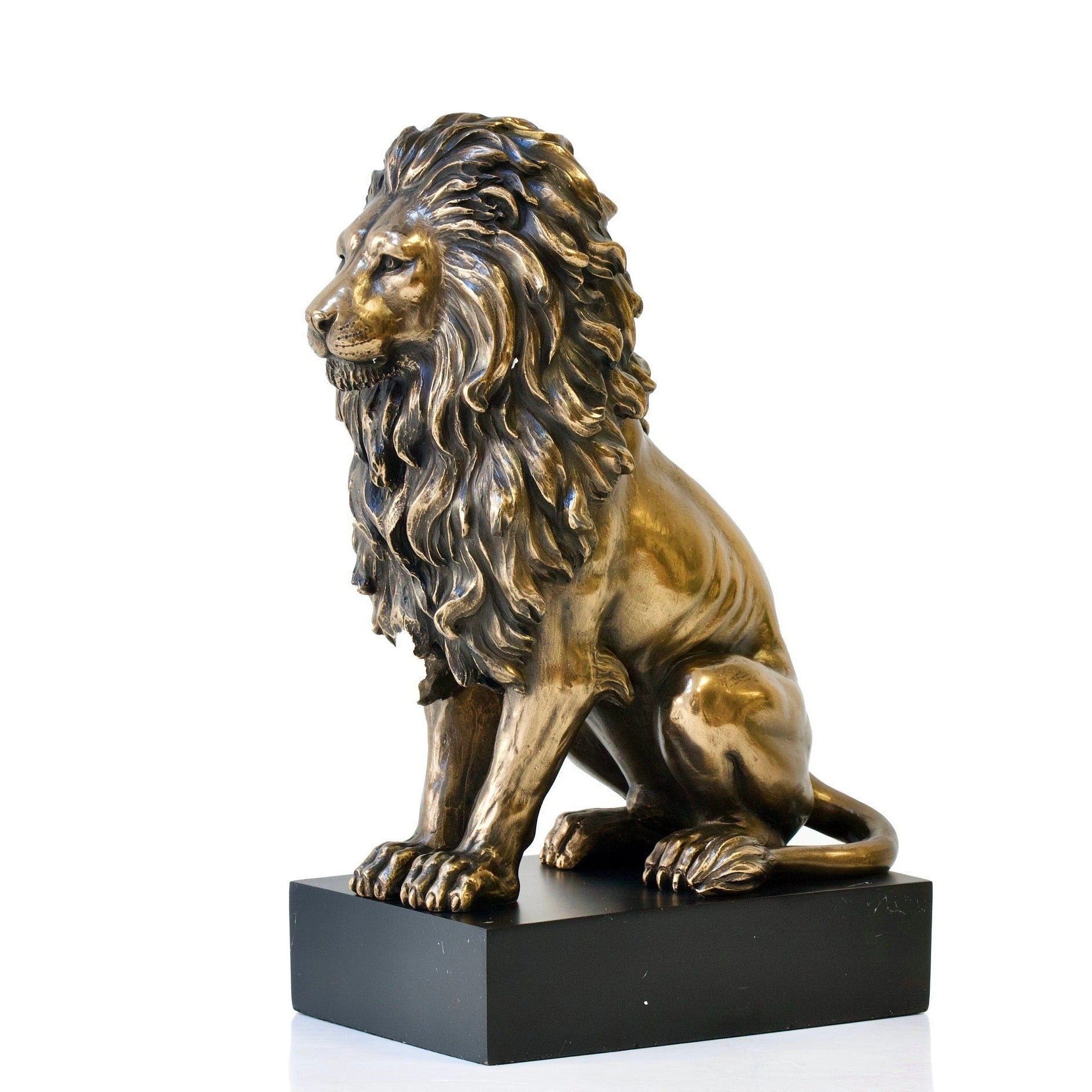 Lion Sitting on The Pedestal Statue