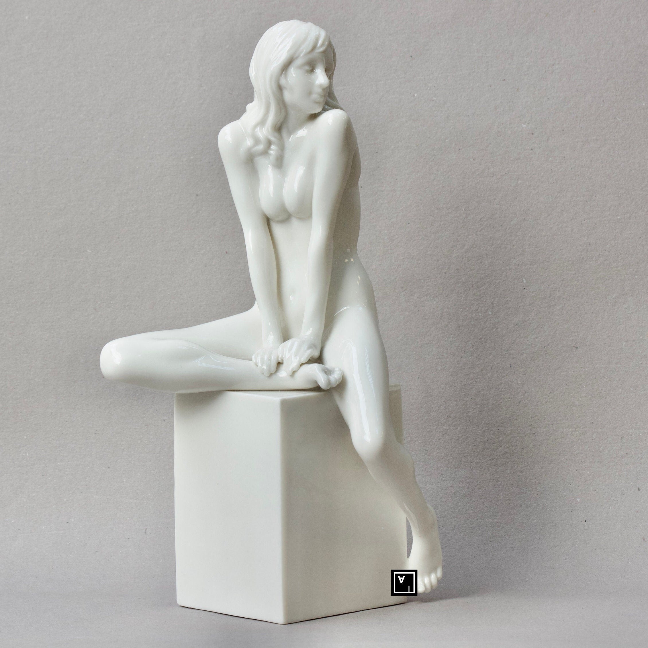 Nude Woman Standing on Bust Sculpture. Female nude Statue