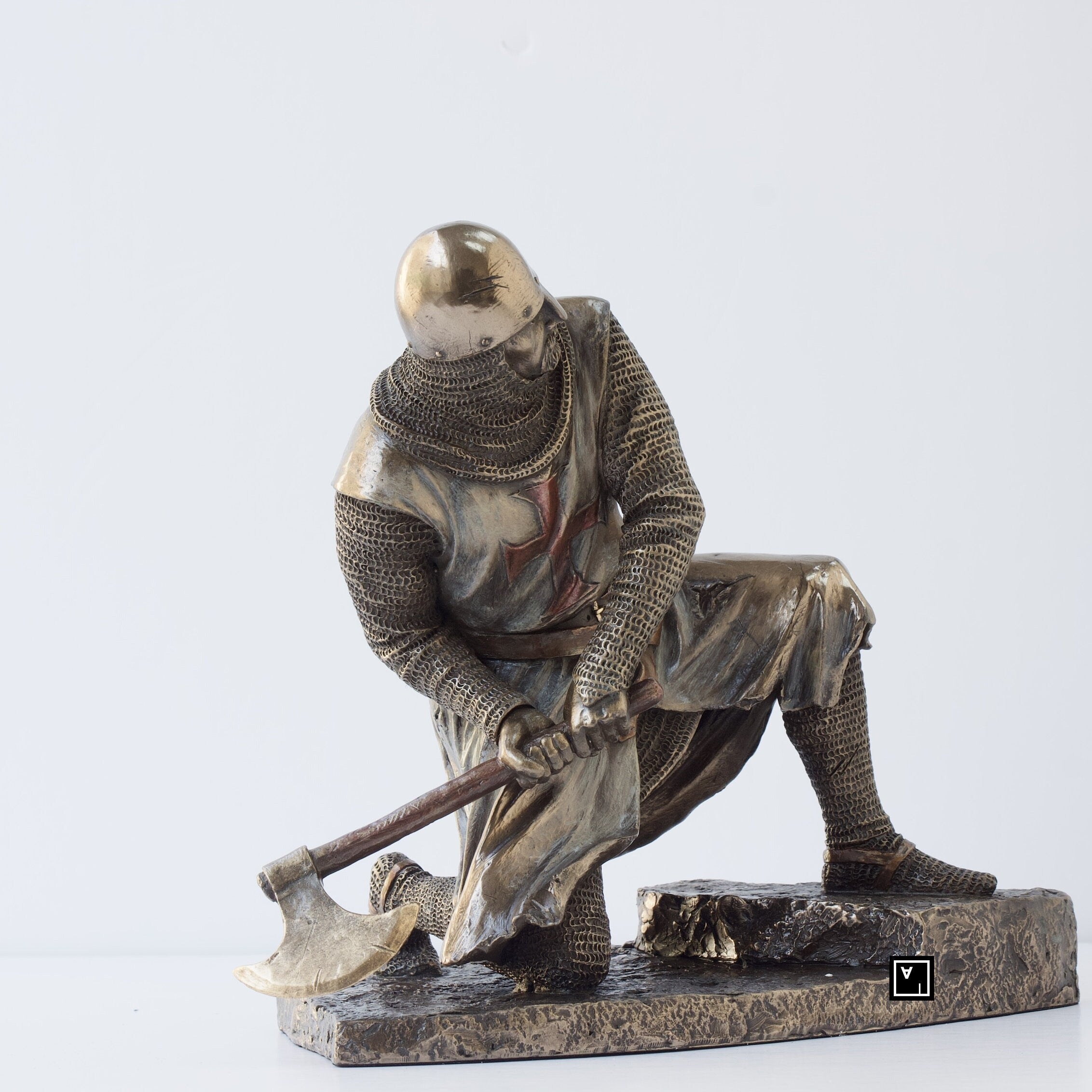 Half kneeling Knights Templar Wielding Battle Axe Statue