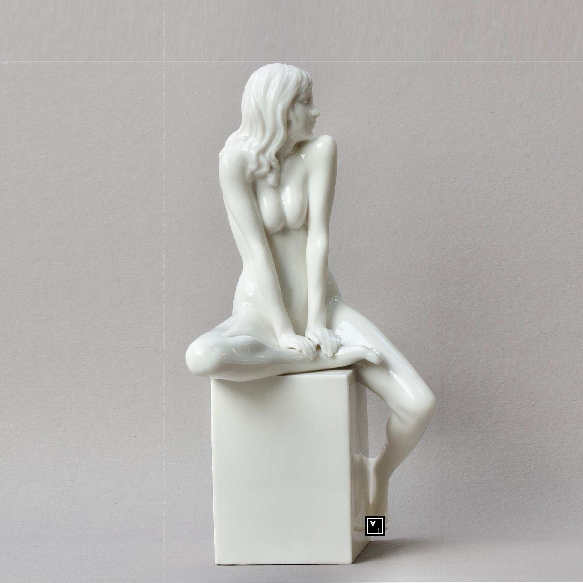 Nude Woman Standing on Bust Sculpture. Female nude Statue