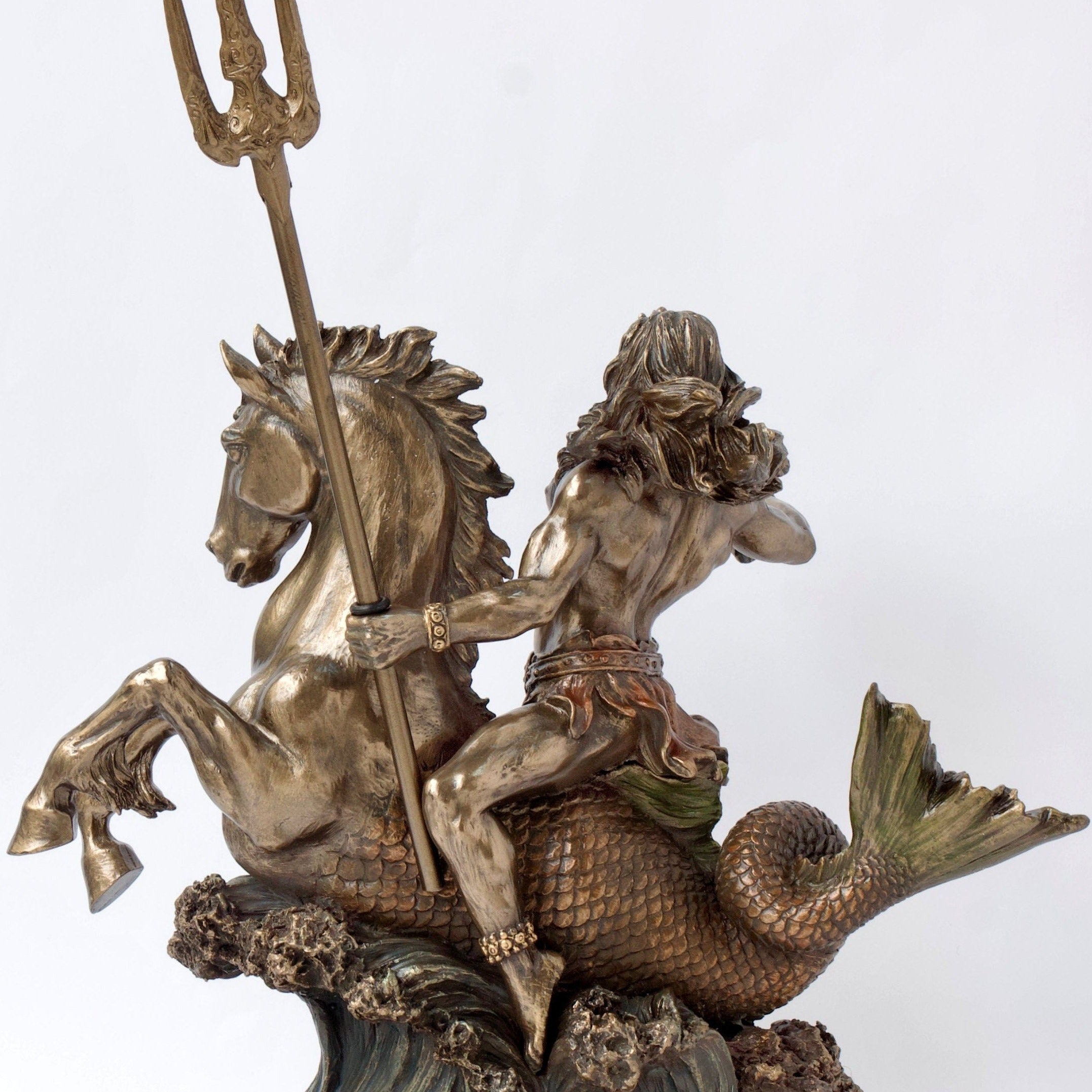 Poseidon with Trident riding a Hippocampus Statue