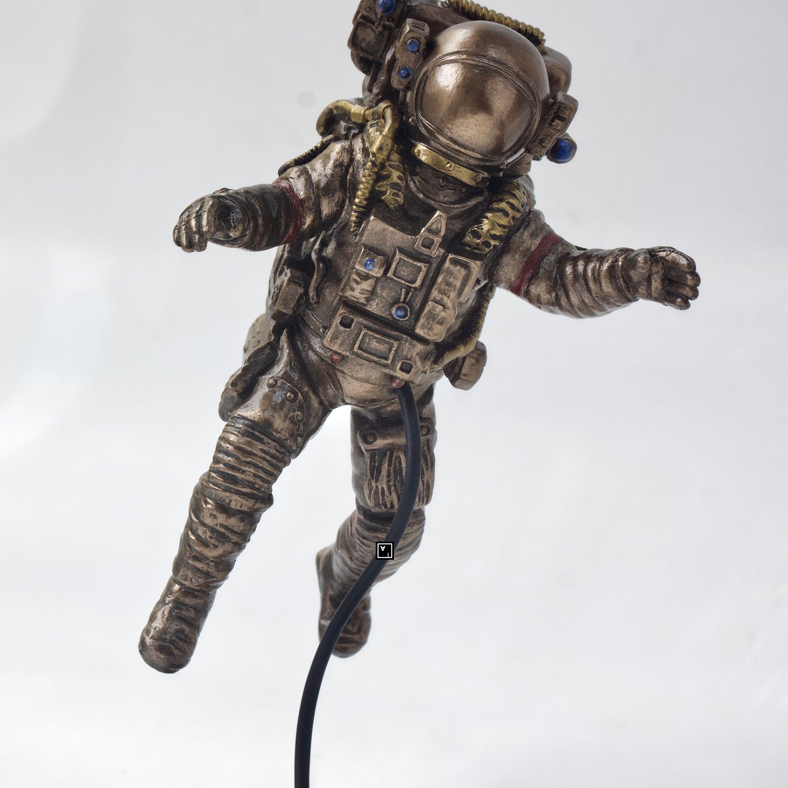 Astronaut Figurine.Astronaut Floating In Zero Gravity,