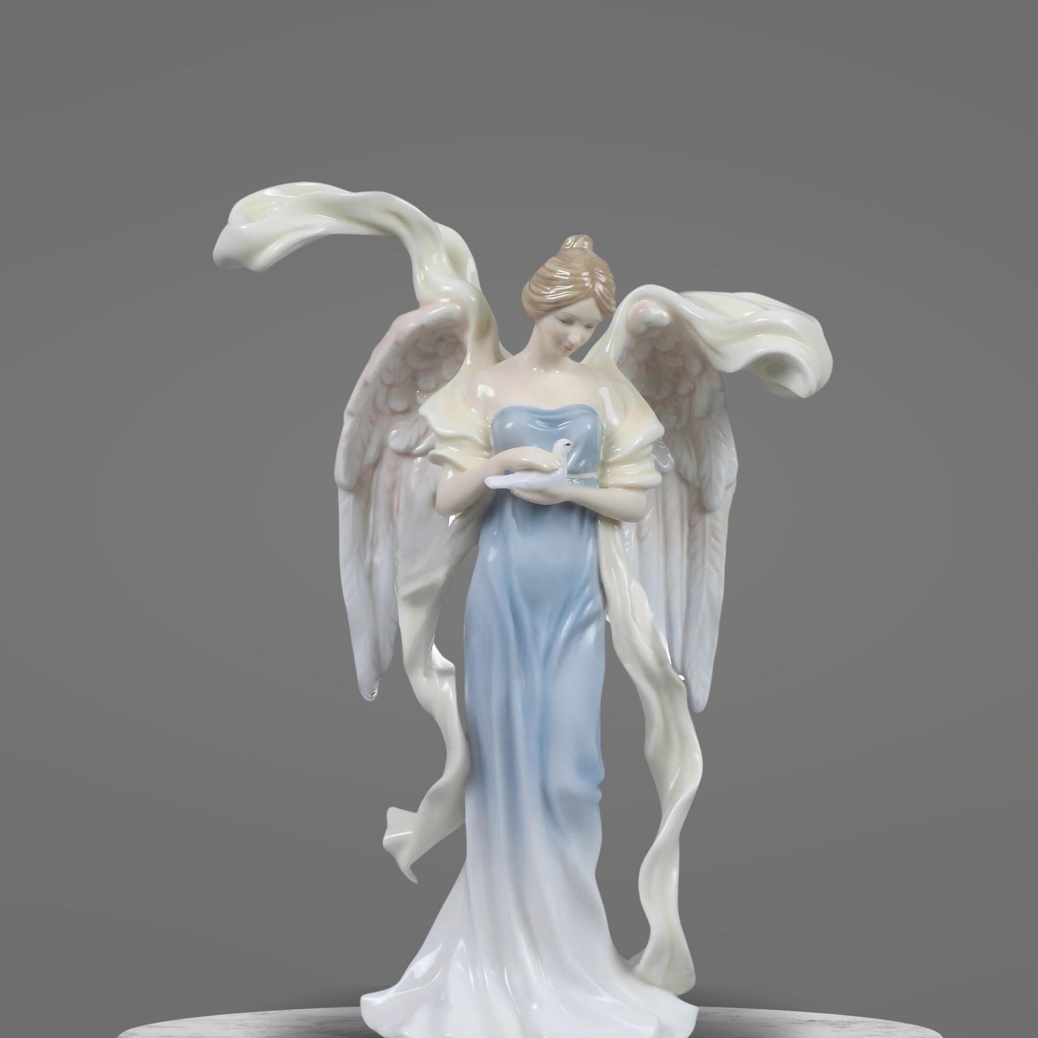 9.75 Inch Glazed Porcelain Open Winged Angel Figurine Holding Dove