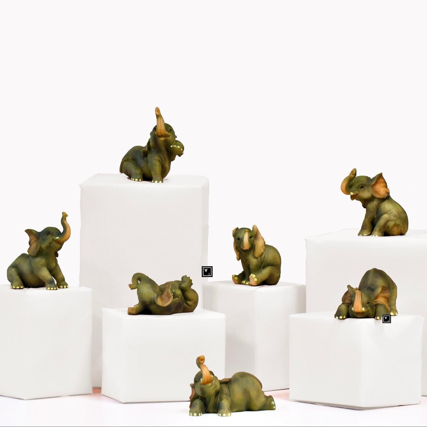 Seven Pieces Baby Elephant Figurine. Good Luck baby Elephants